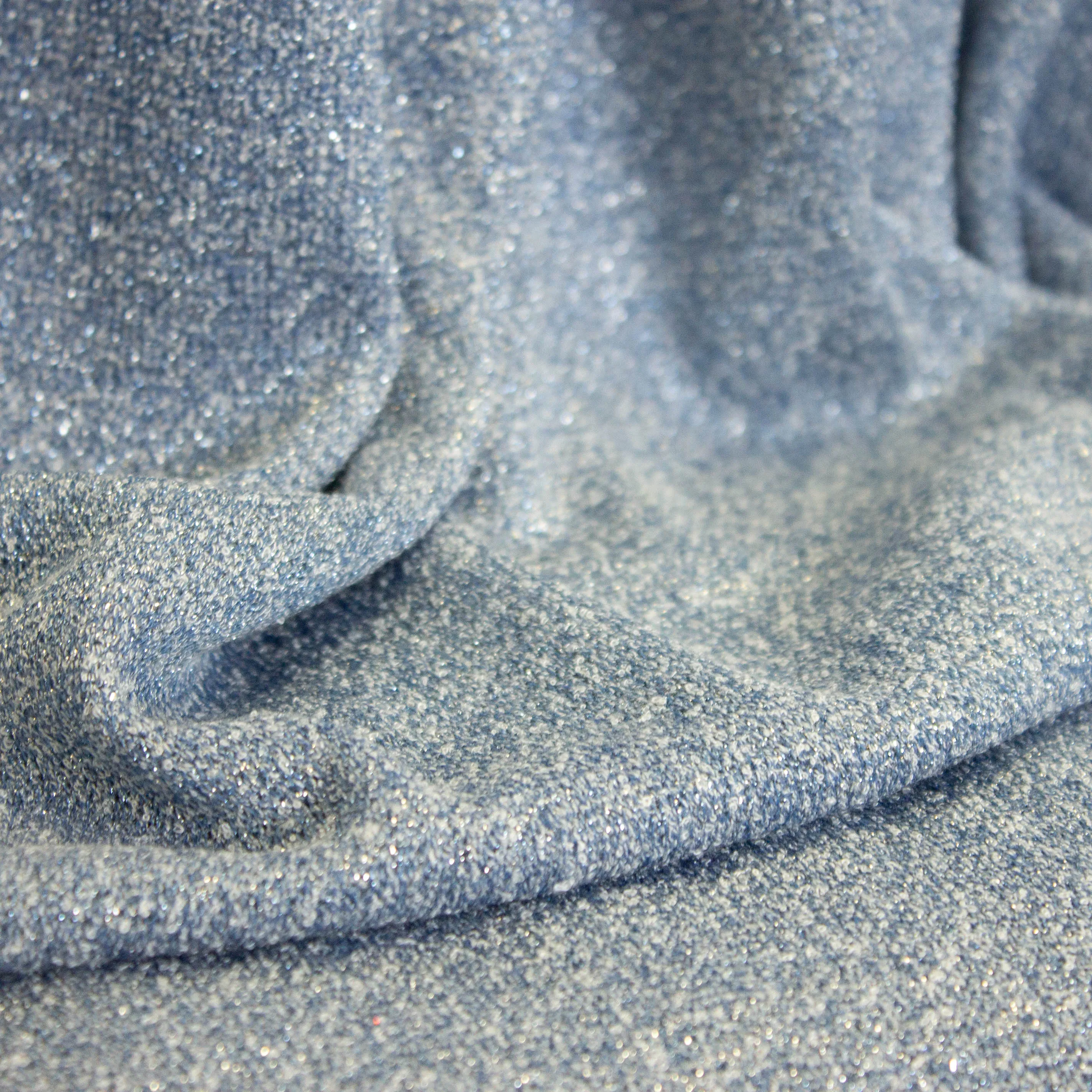 Tricot blauw met zilveren glinstering