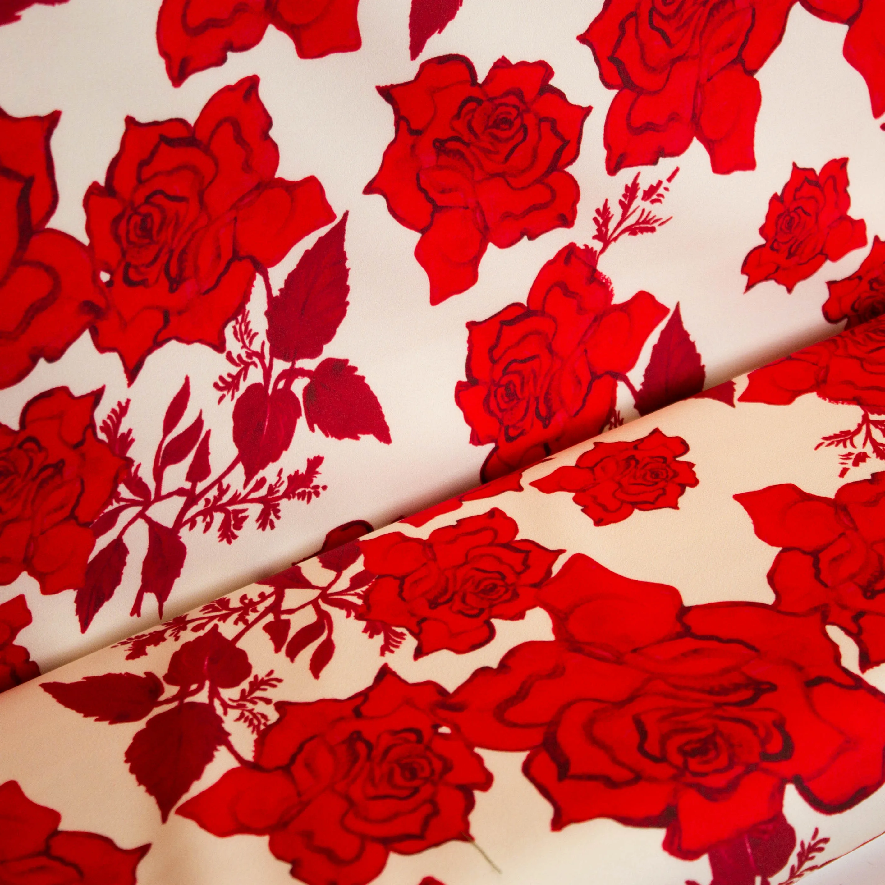 Polyester stretch gebroken wit met bloemen