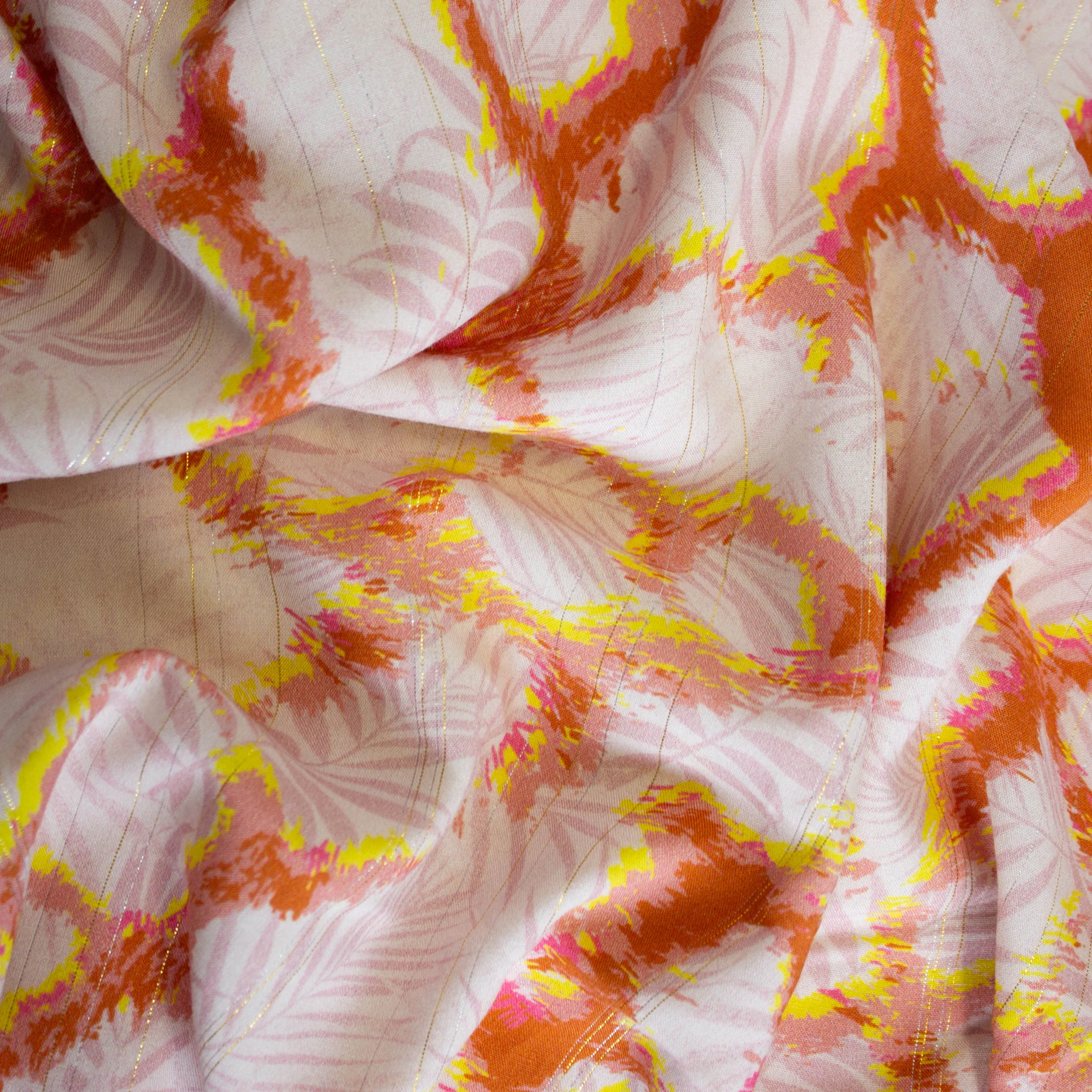 Viscose oranje patroon met blaadjes en glinstering