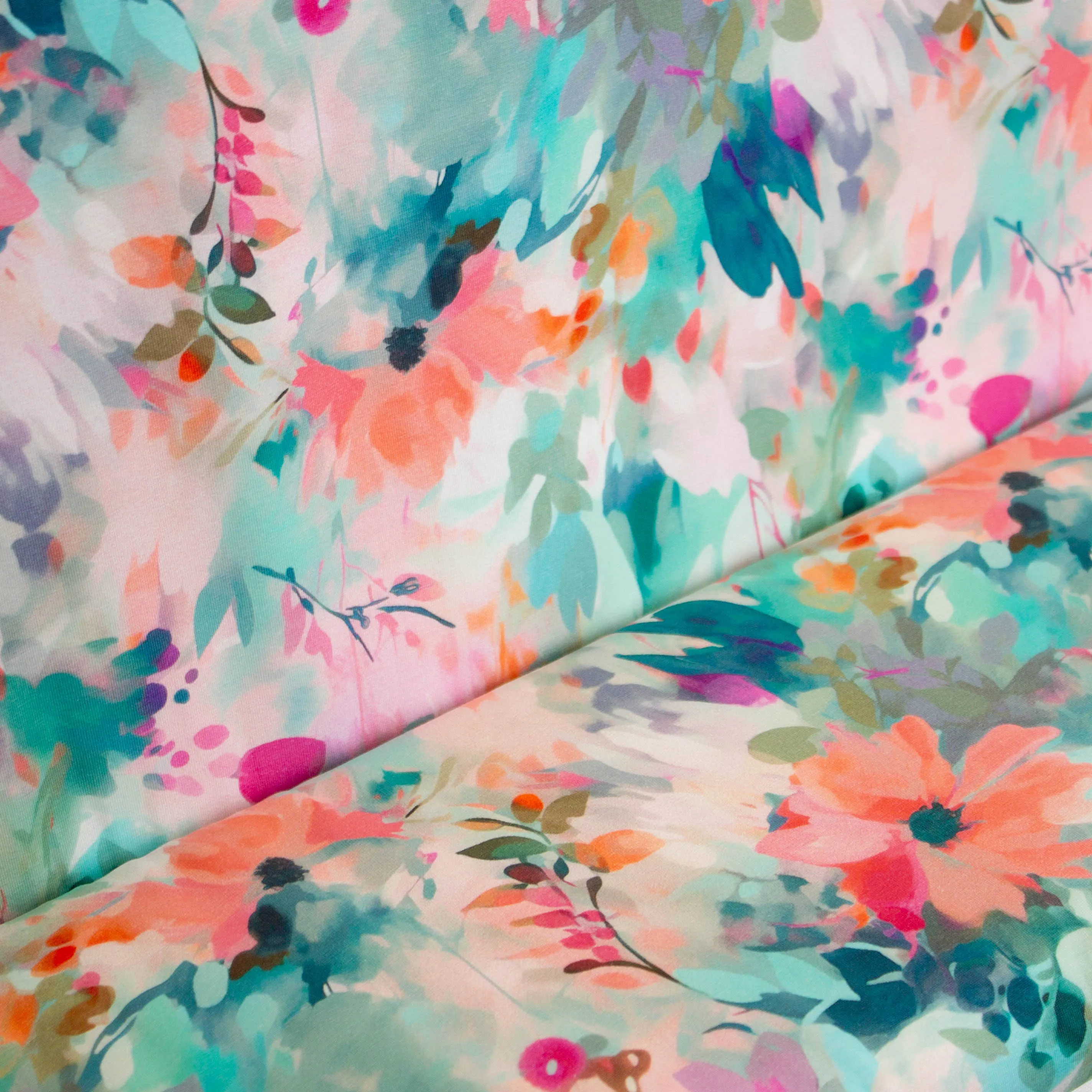 Tricot turquoise met bloemen