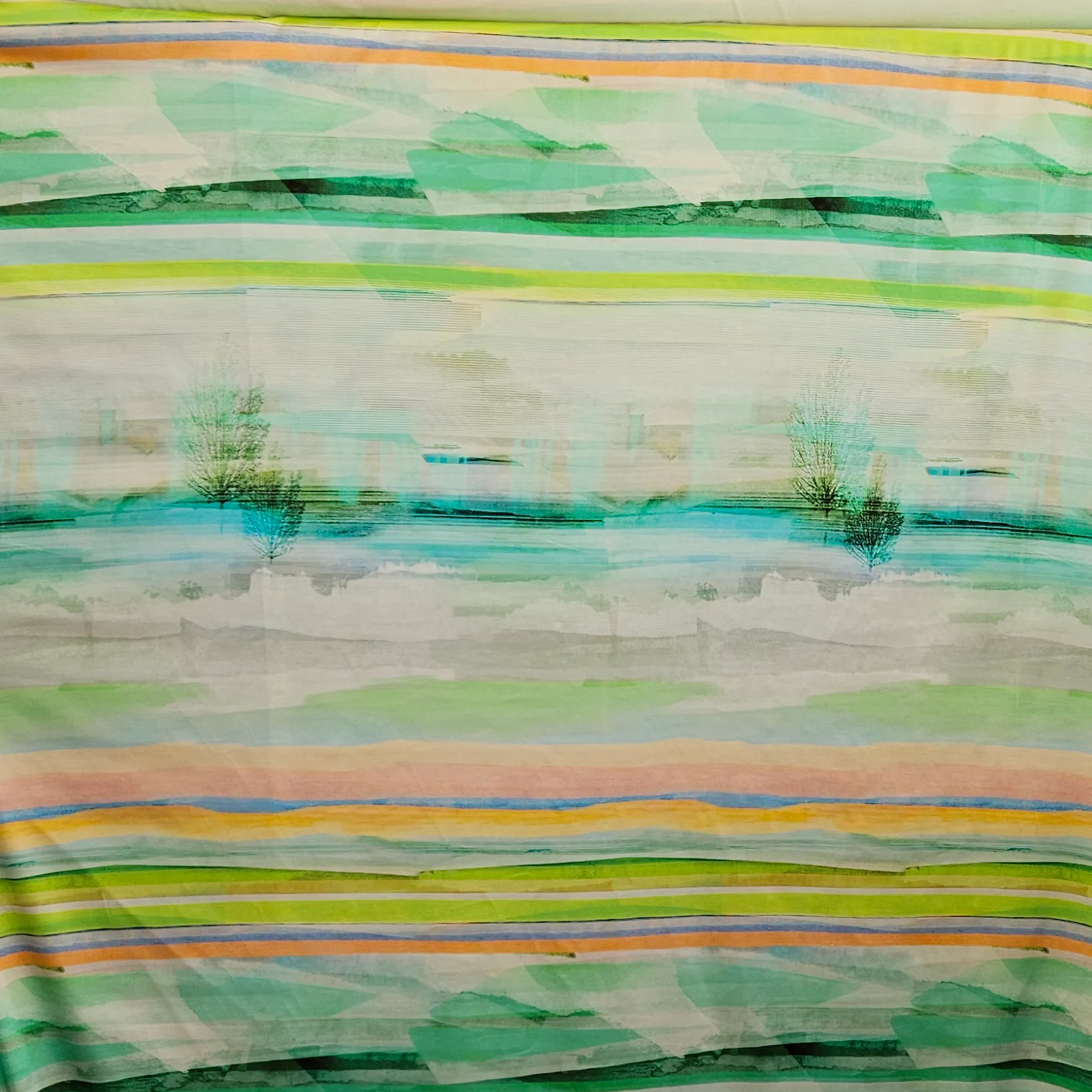 Viscose landschaps print met groen / oranje Lorré