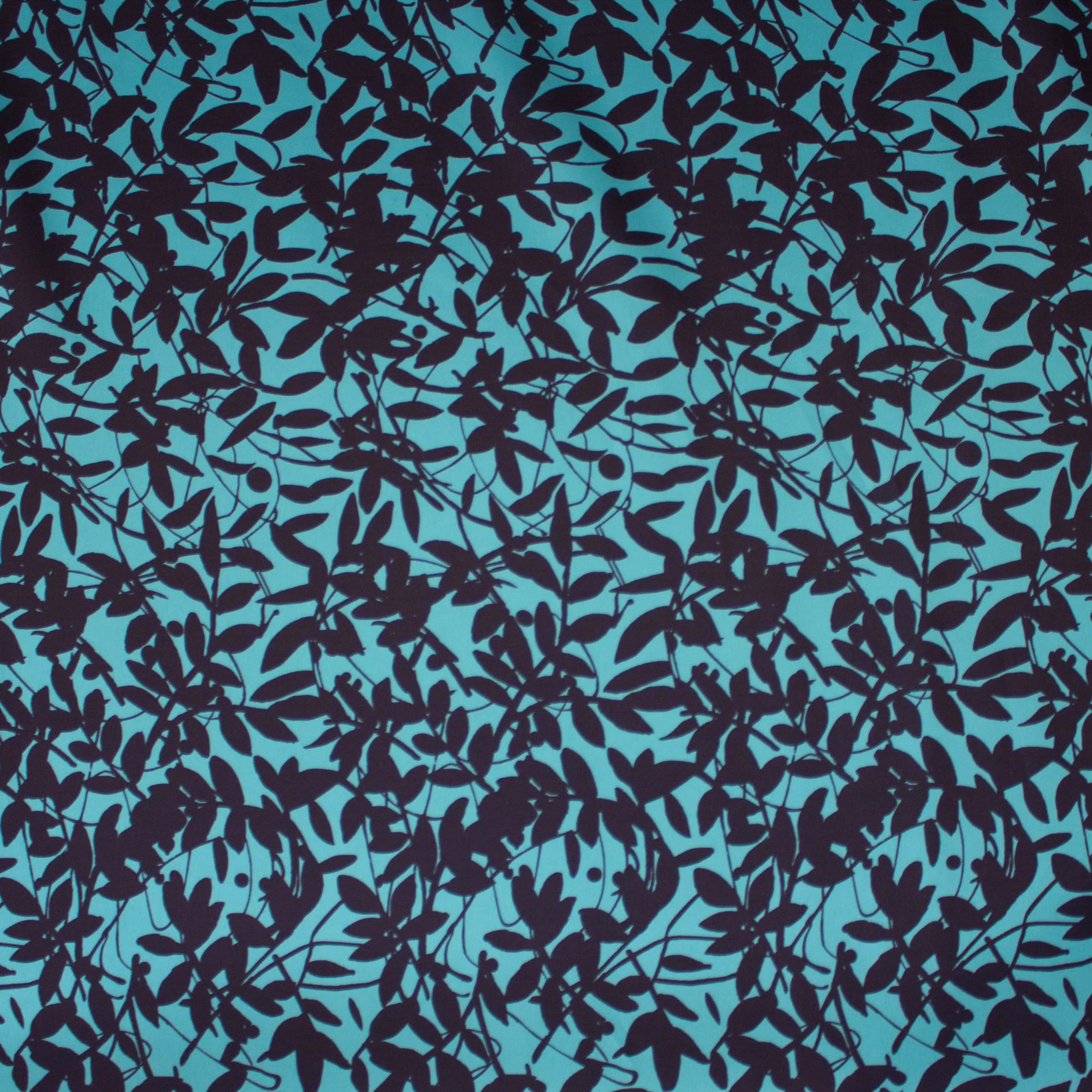 Zijde polyester turquoise met plantenpatroon - Lorré