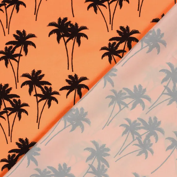 Badpakstof glanzend oranje met palmbomen
