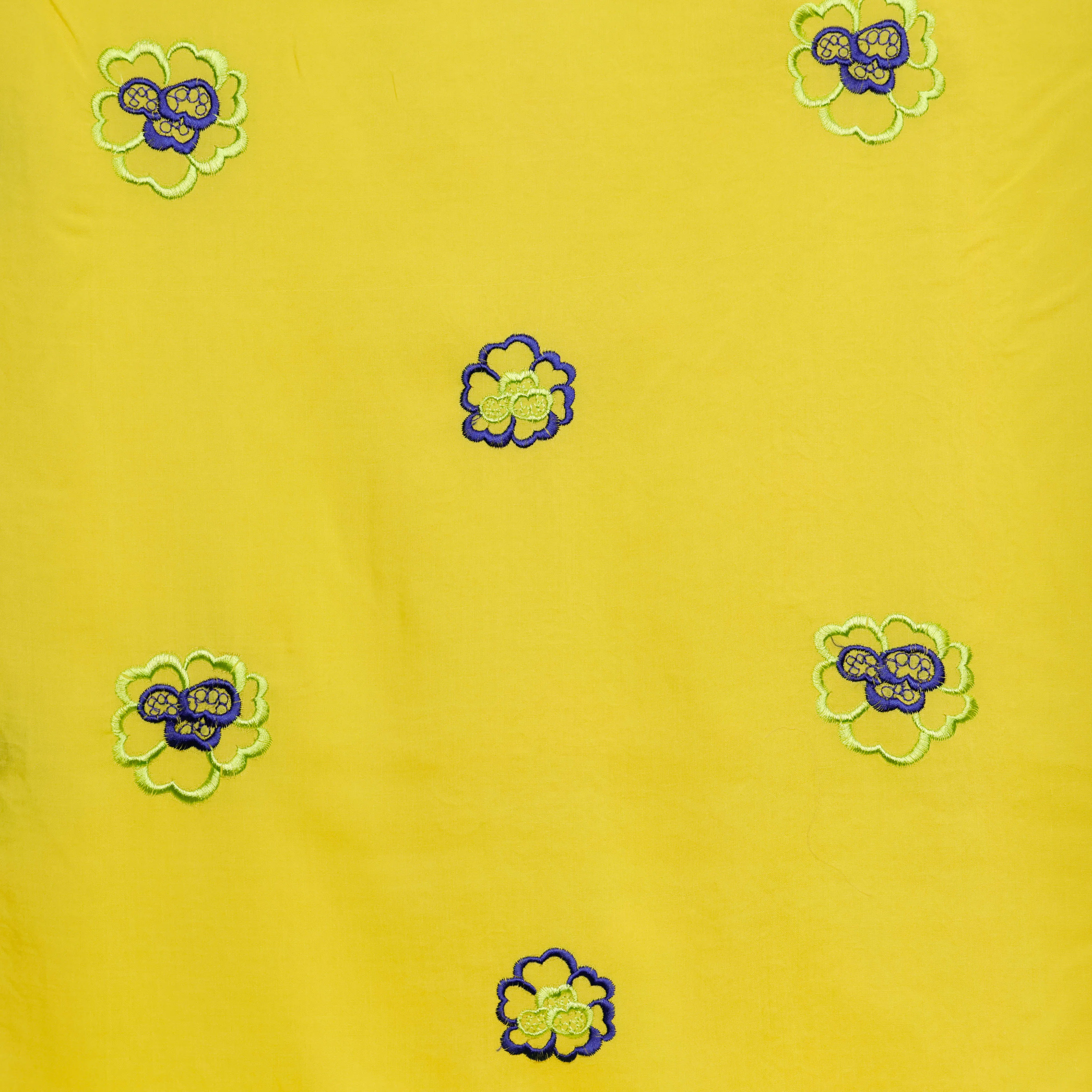 Broderie geel met bloemen