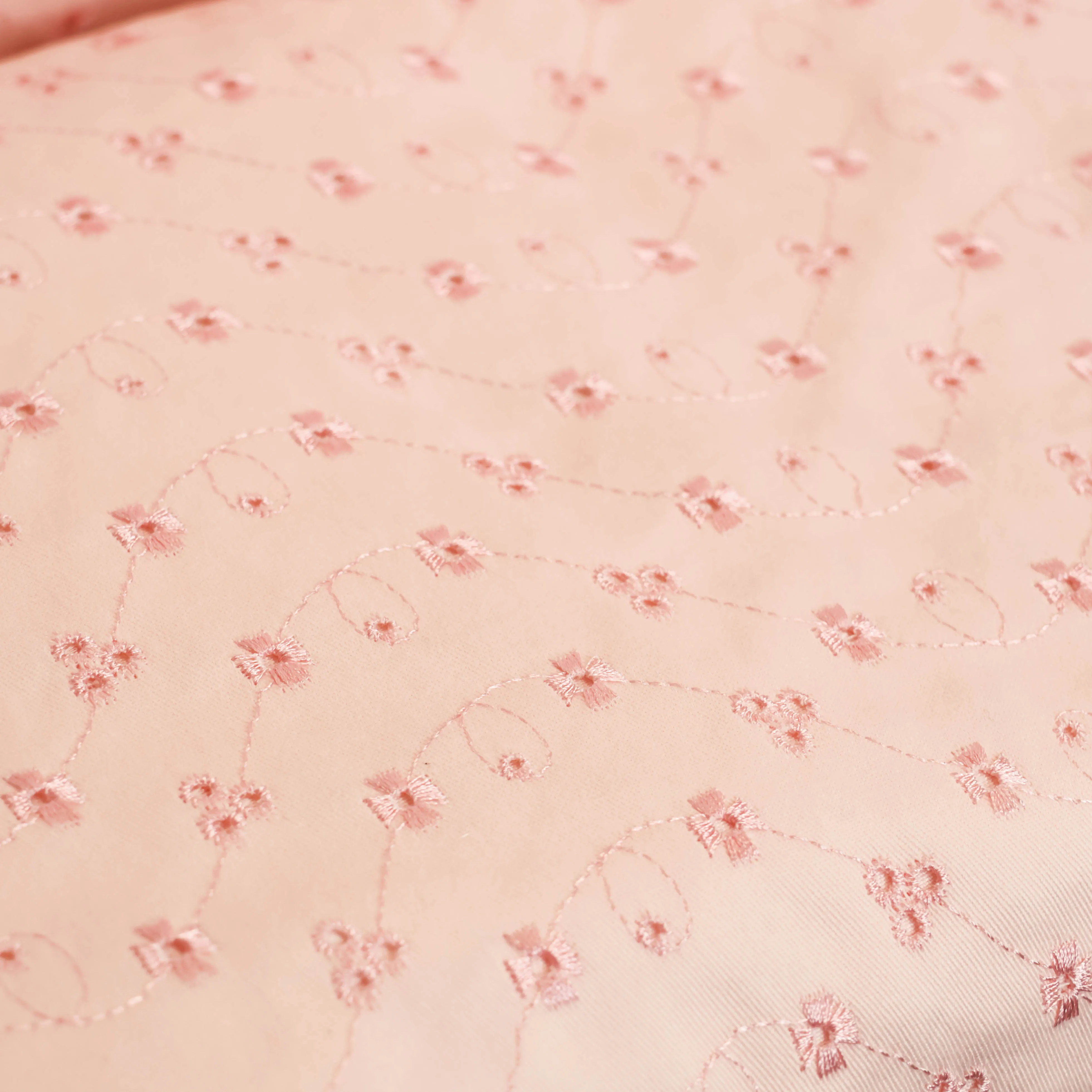 Broderie roze met bloemen