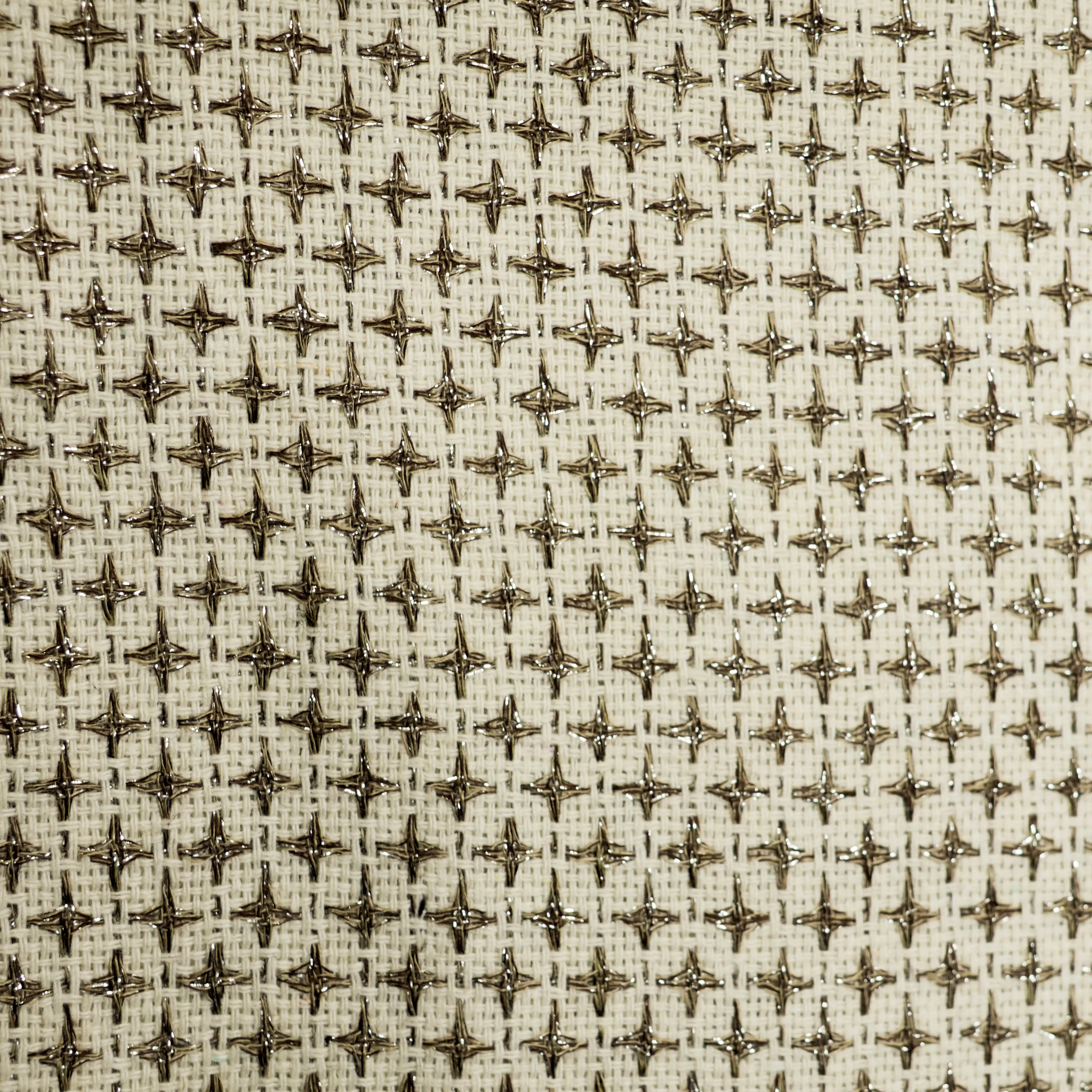 Chanelstof beige met glinsterende kruisjes