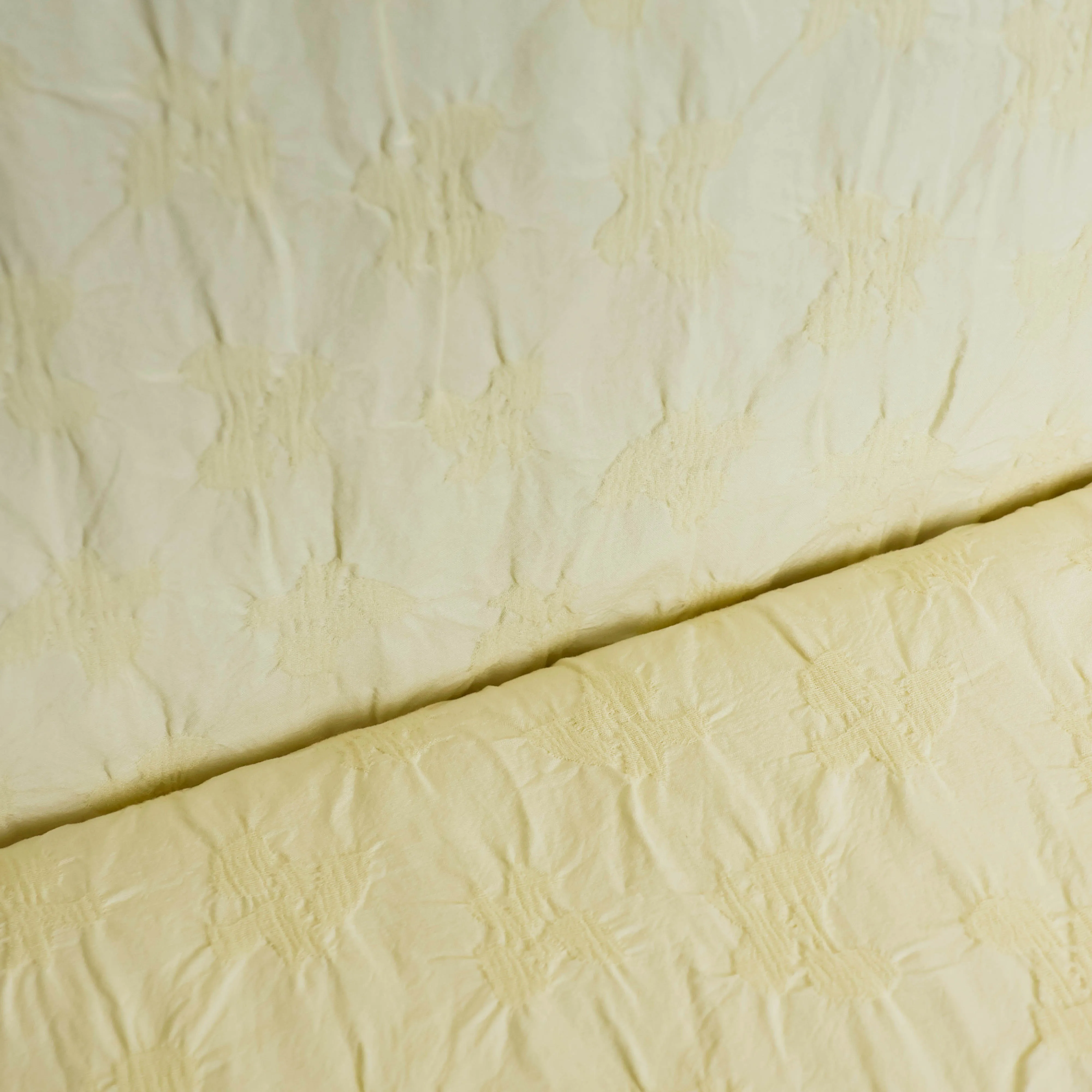 Jacquard zacht geel
