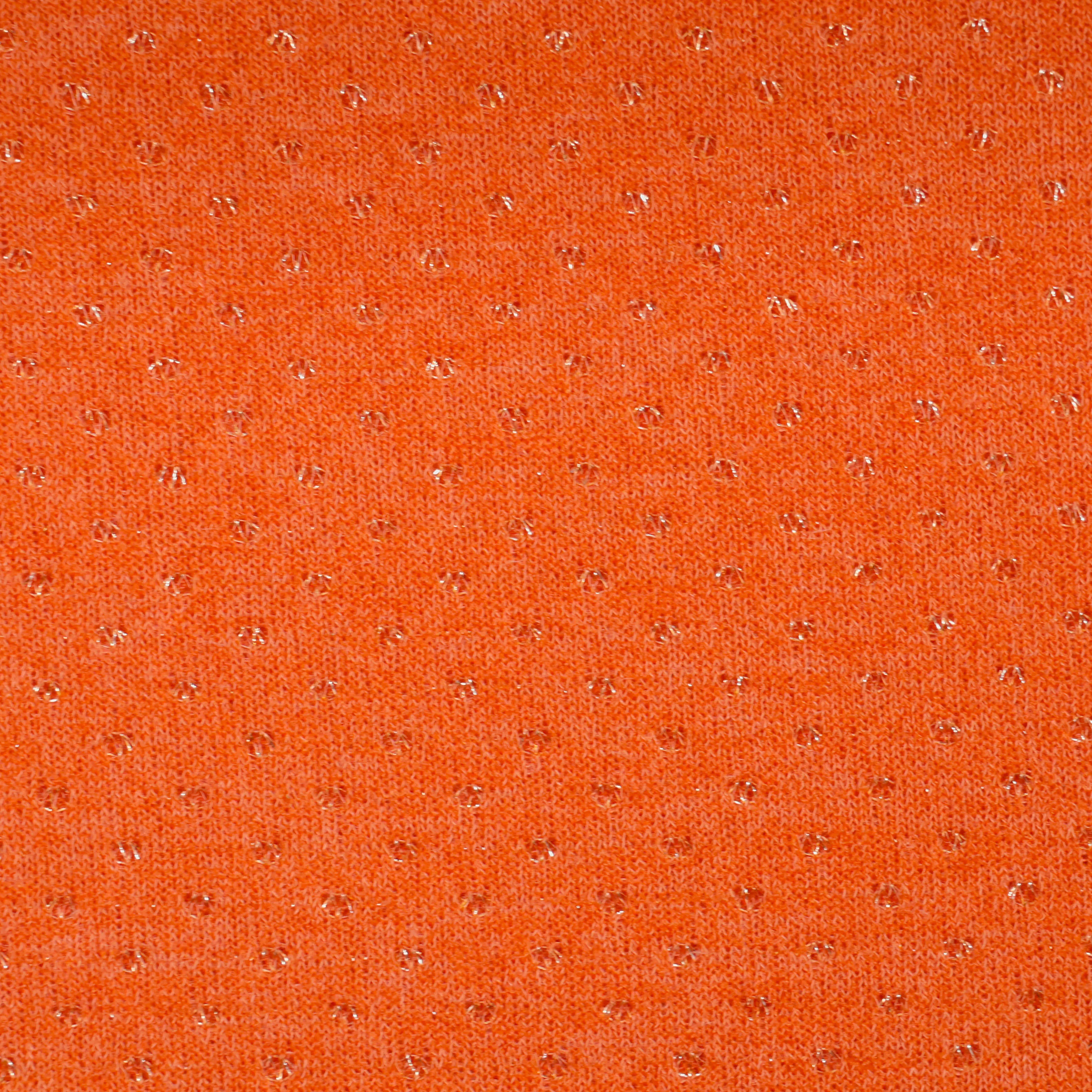 Brei oranje met glinsterende bolletjes