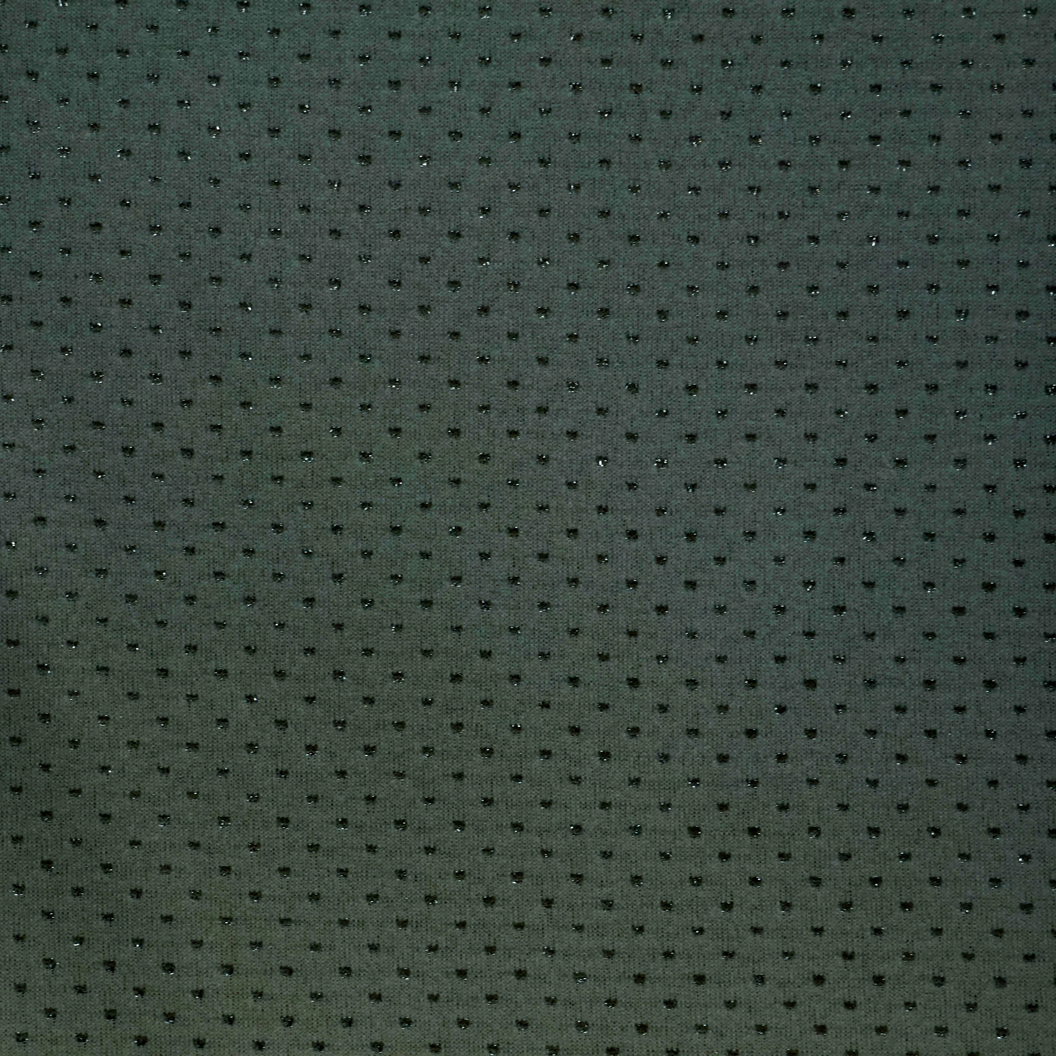 Brei donkergrijs met groene tint en glinsterende bolletjes