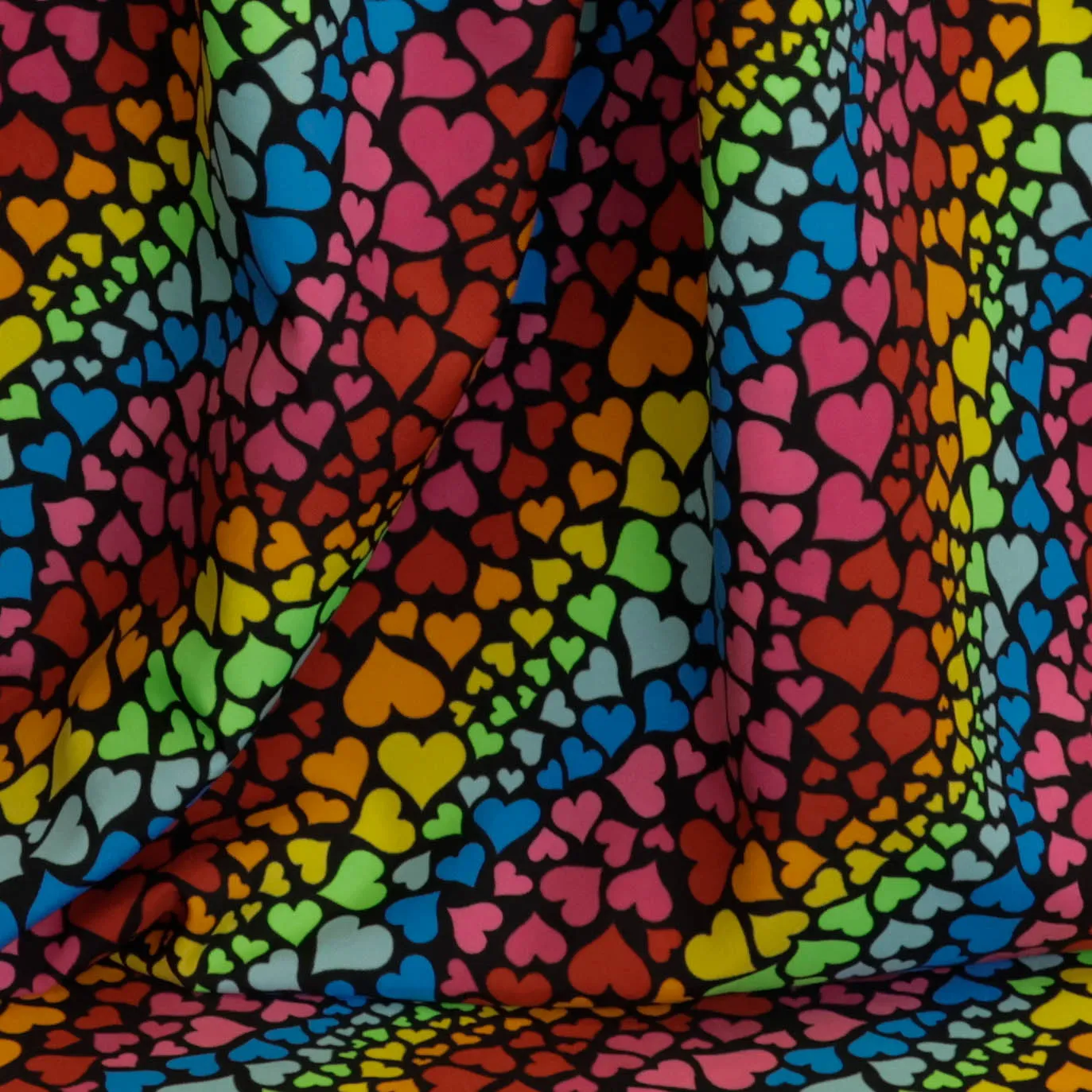 Polyester zwart met regenbooghartjes