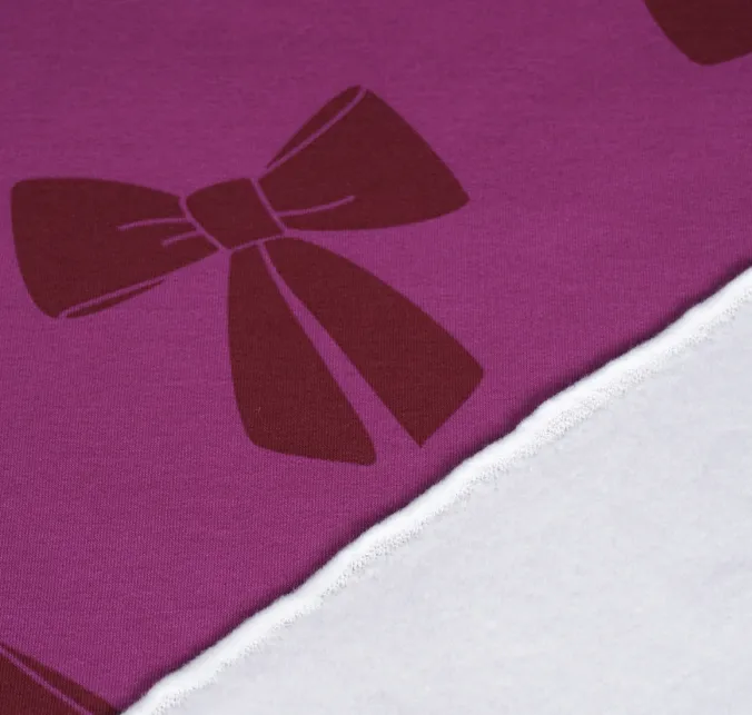 Sweaterstof cyclaam paars met strikken  - Qjutie & the Qjutest