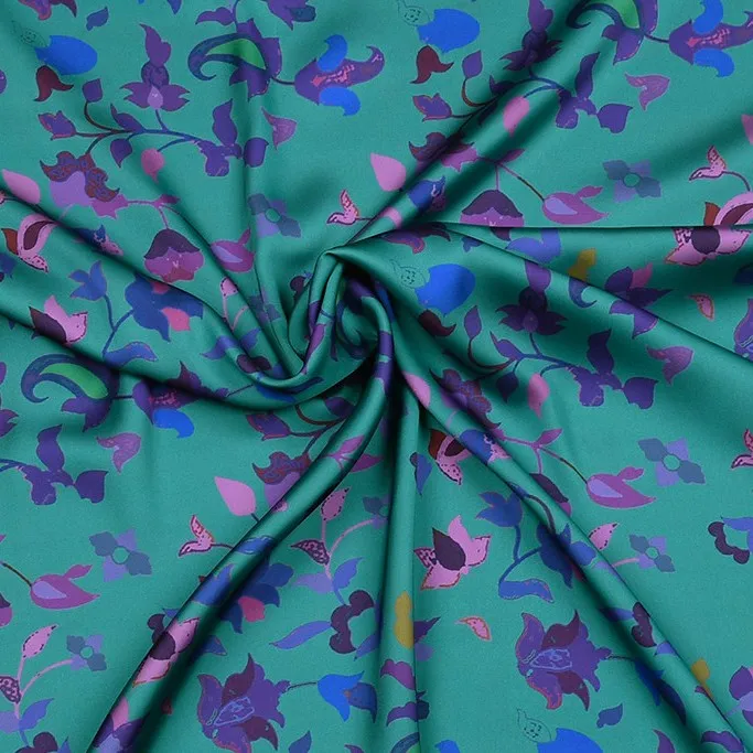Gesatineerde polyester turquoise met bloemen