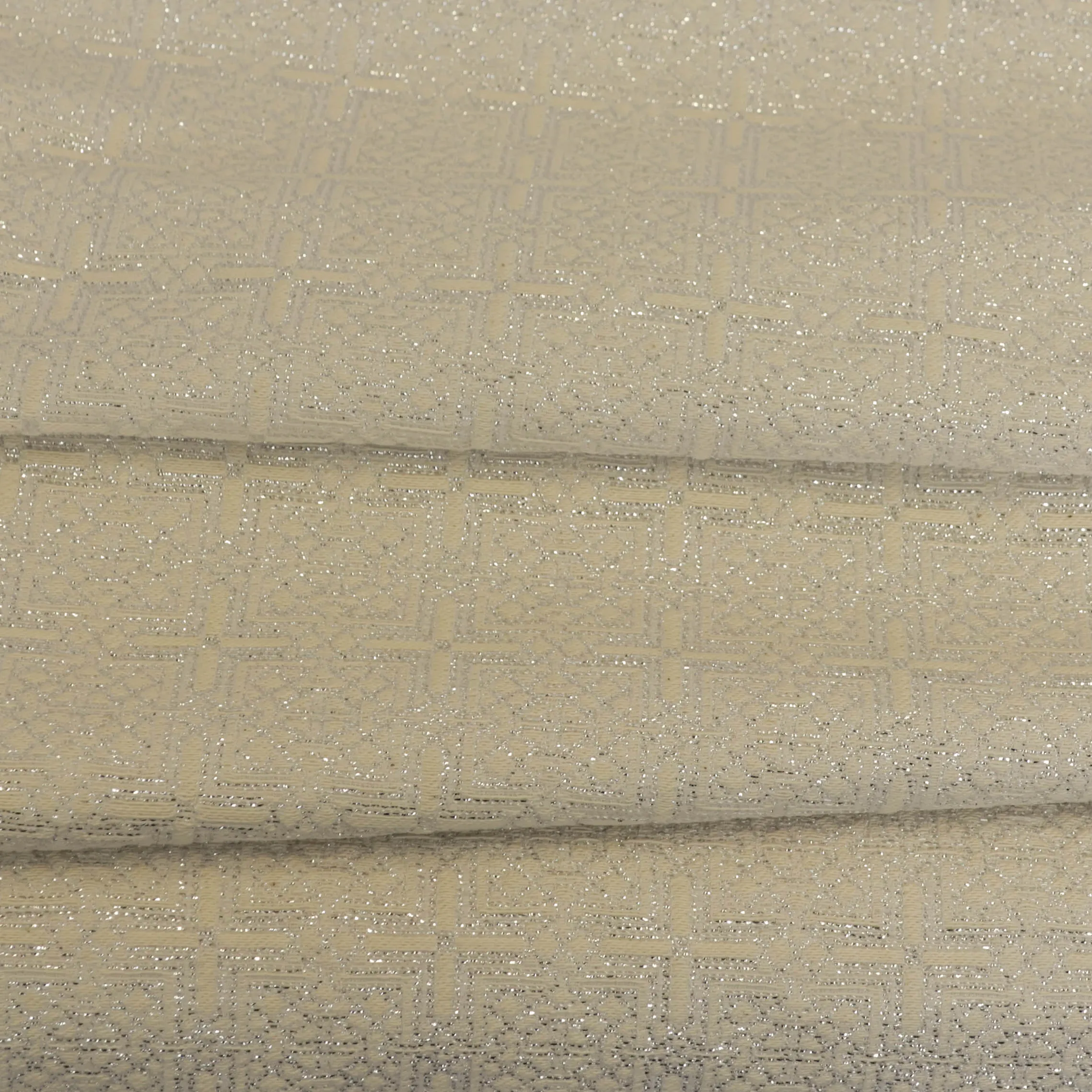 Jacquard wit met motief in zilveren glinsterdraad