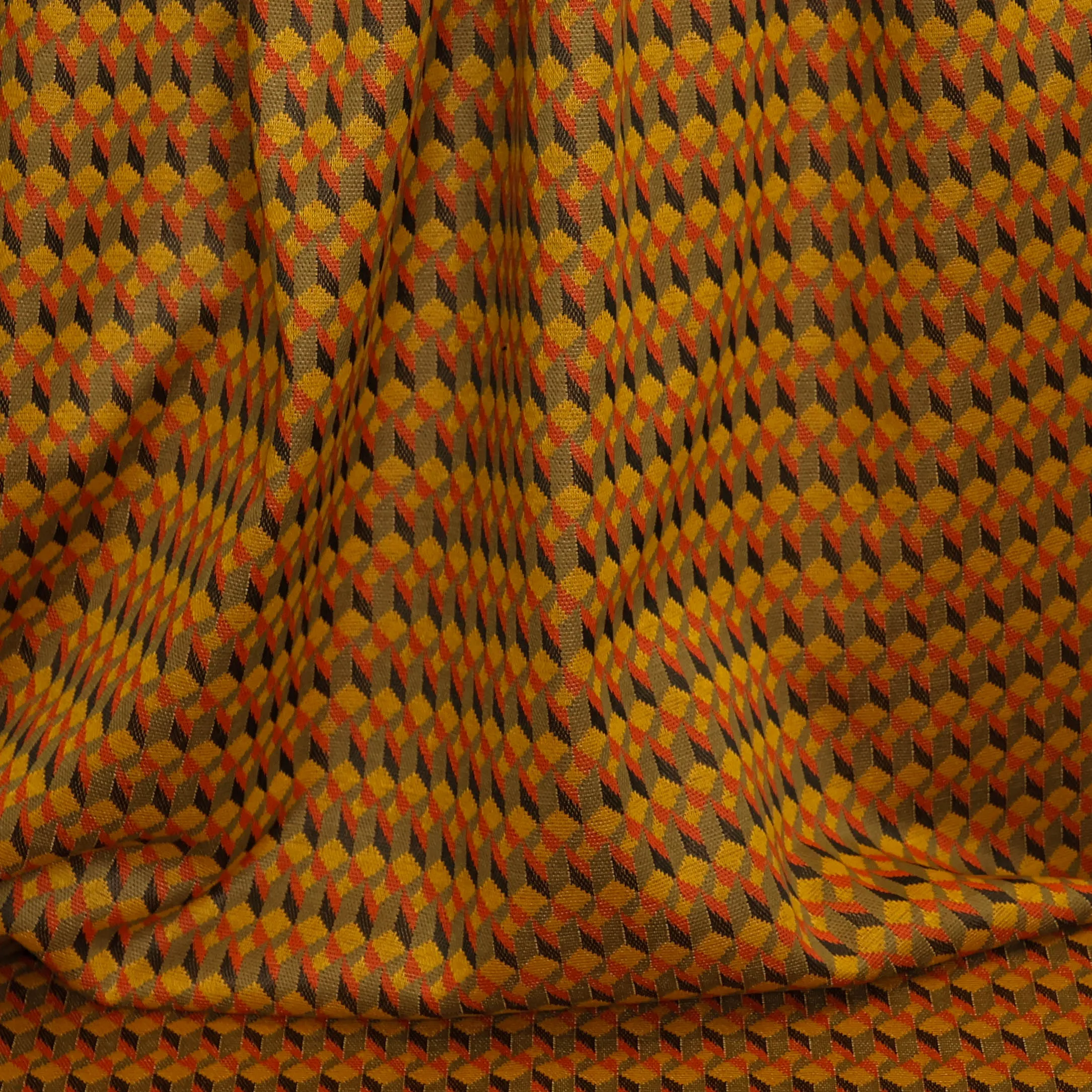 Breistof oranjetinten met geometrisch patroon
