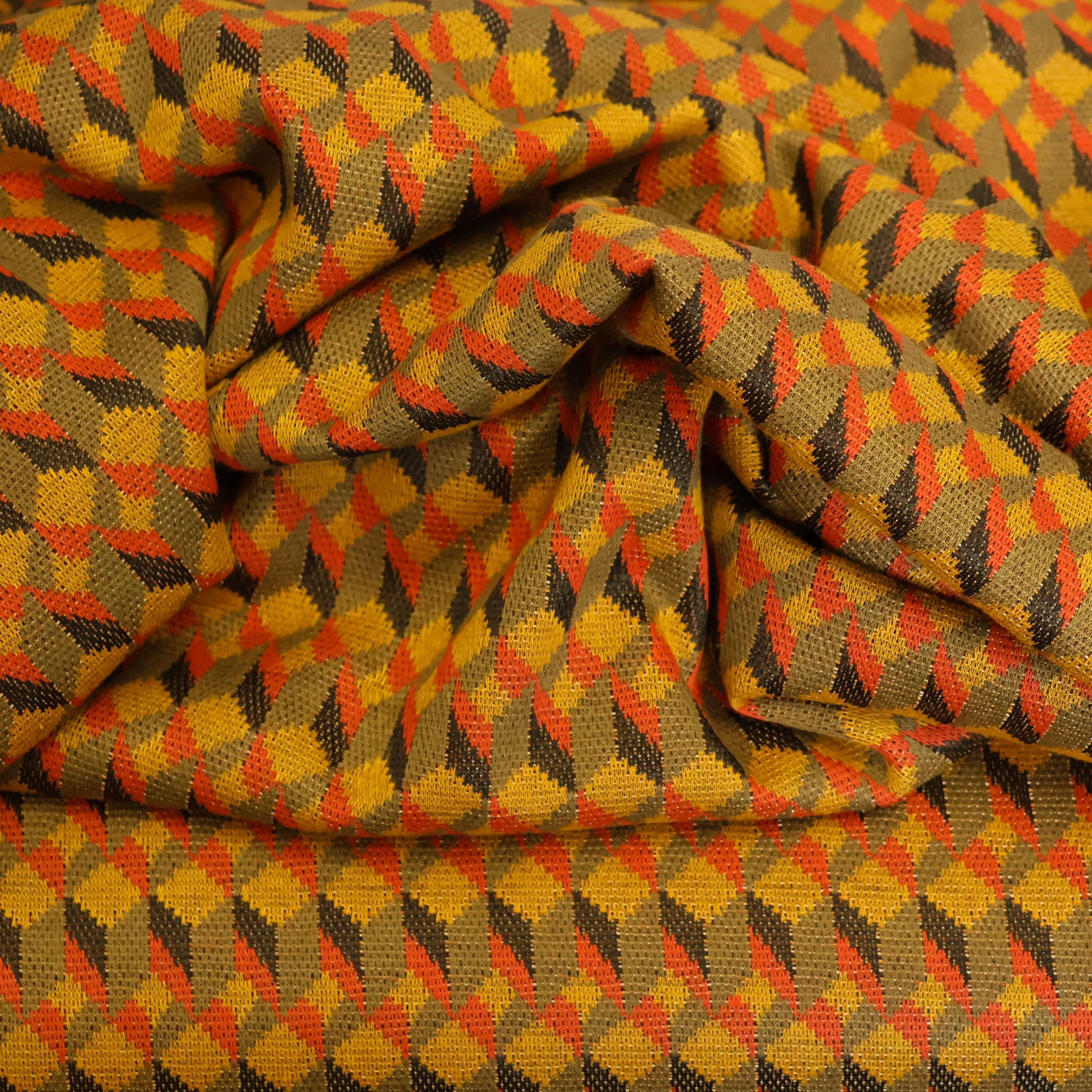 Breistof oranjetinten met geometrisch patroon