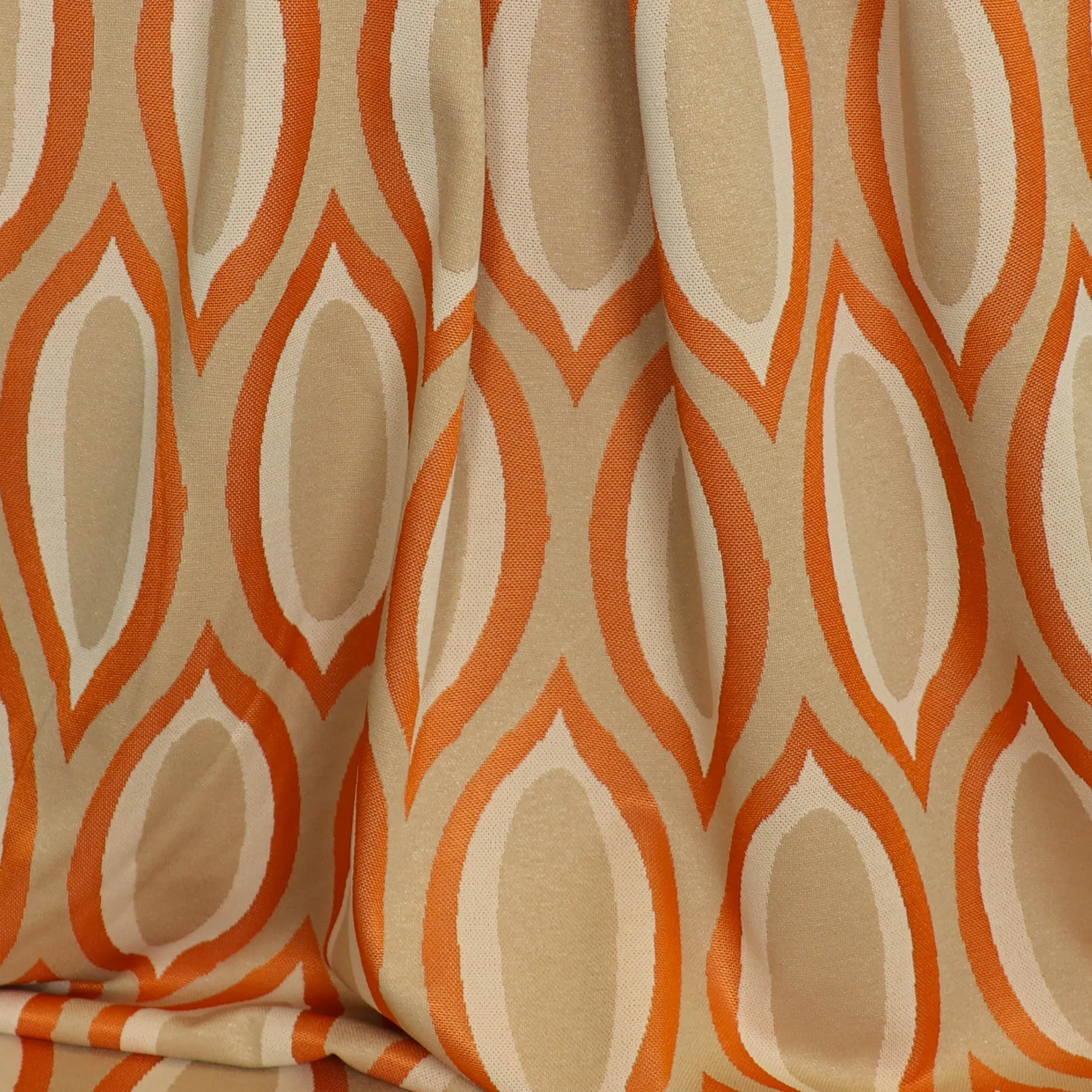 Tricot Jacquard beige met oranje motief