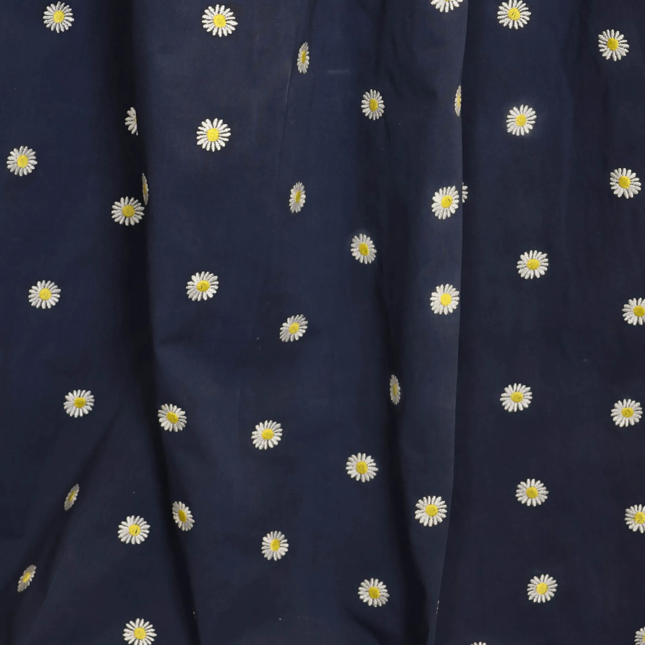 Katoen navy blauw met geborduurde madeliefjes