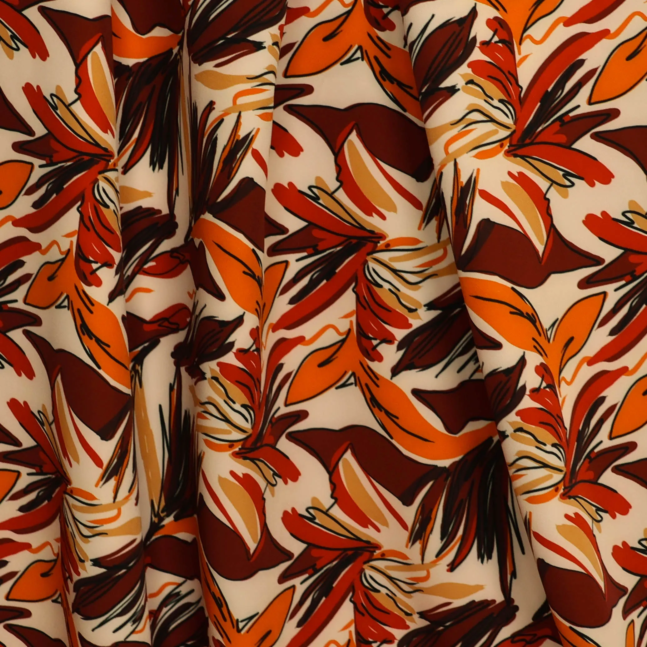 Stretch polyester gebroken wit met patroon in roodtinten
