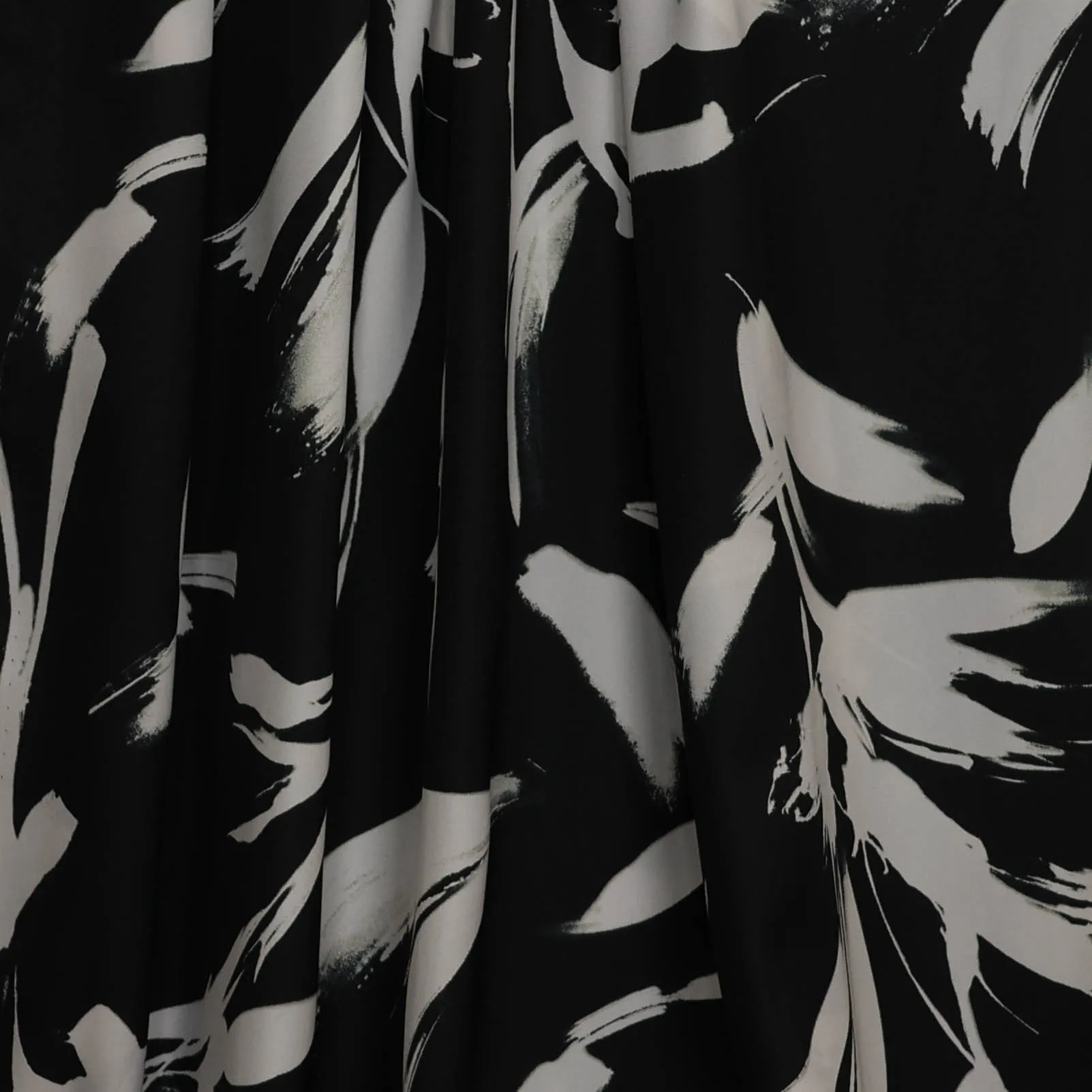 Polyester zwart met wit patroon