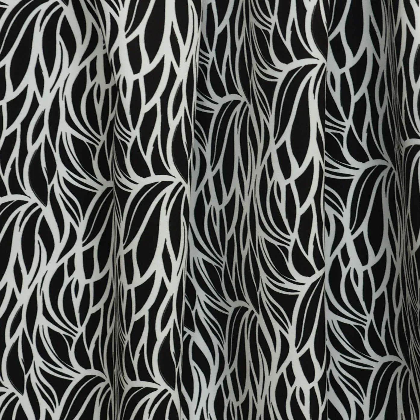 Stretch polyester zwart met wit patroon