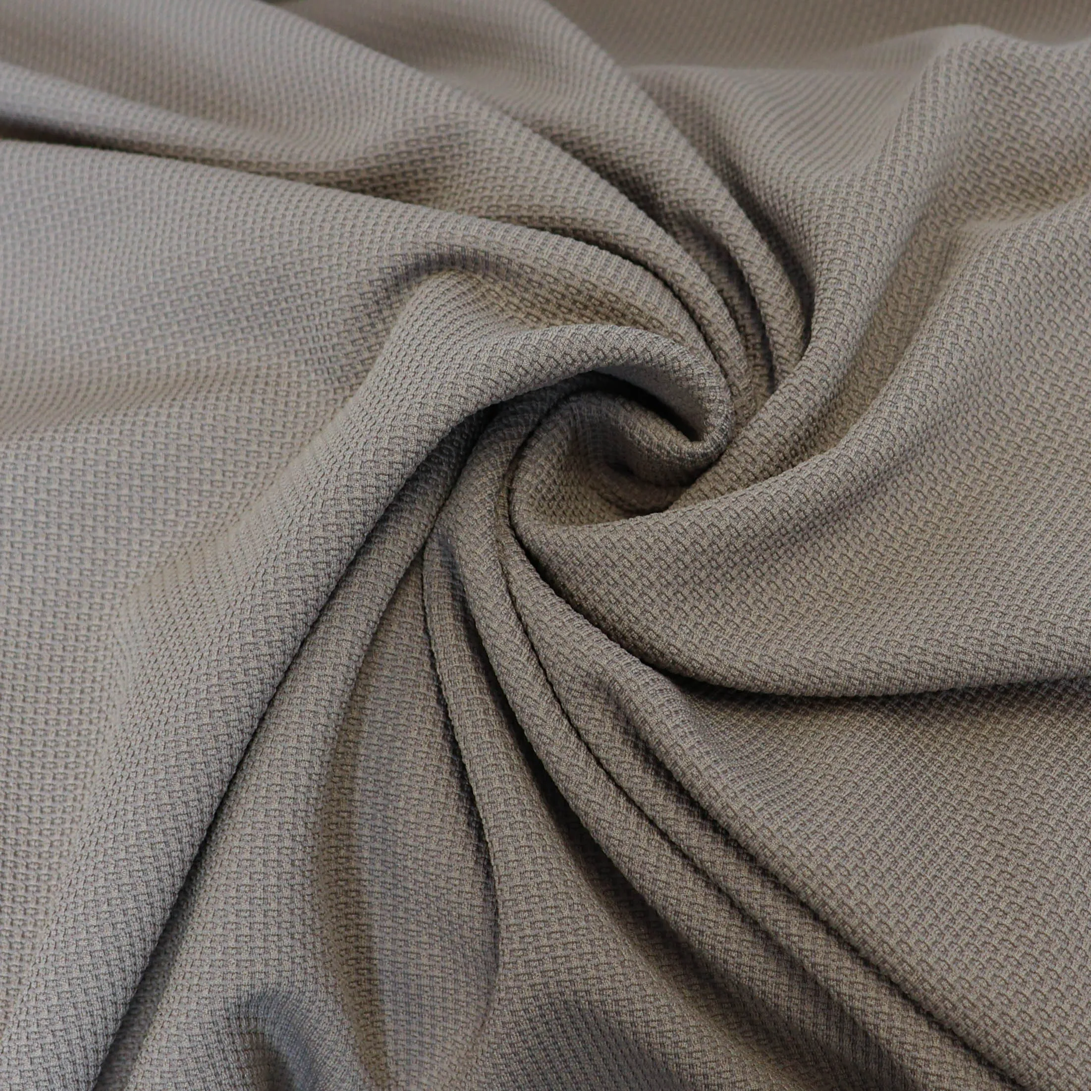 Stretch structuur tricot grijs