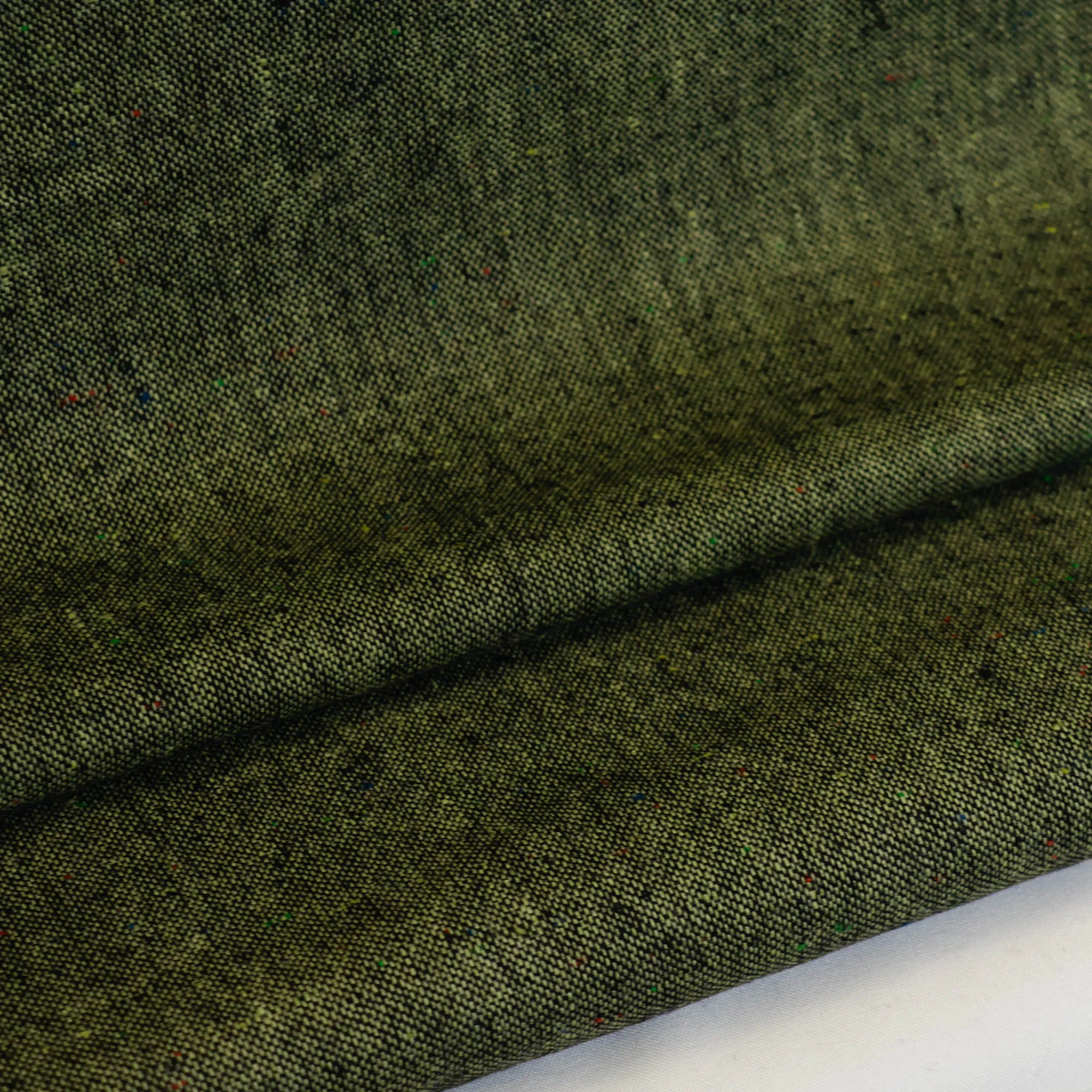 Tweed groen met gekleurde stipjes