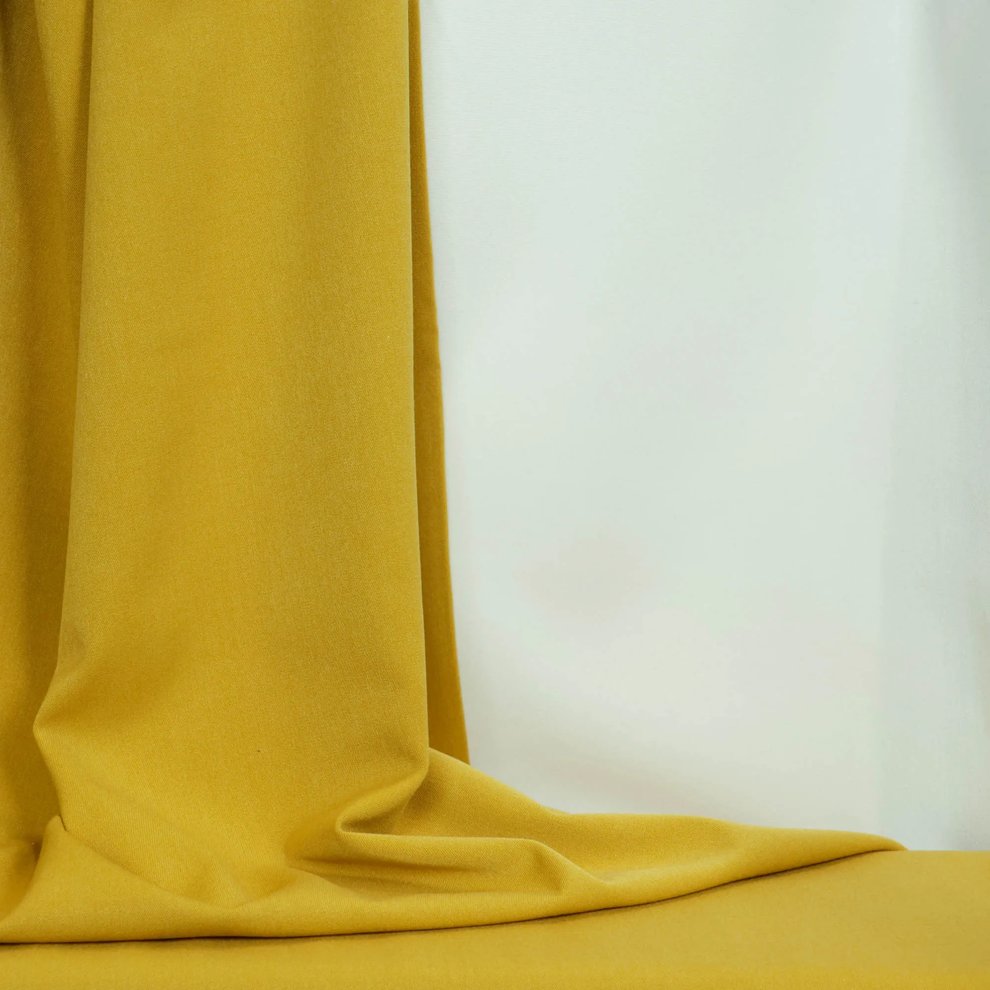 Stretch polyester geel