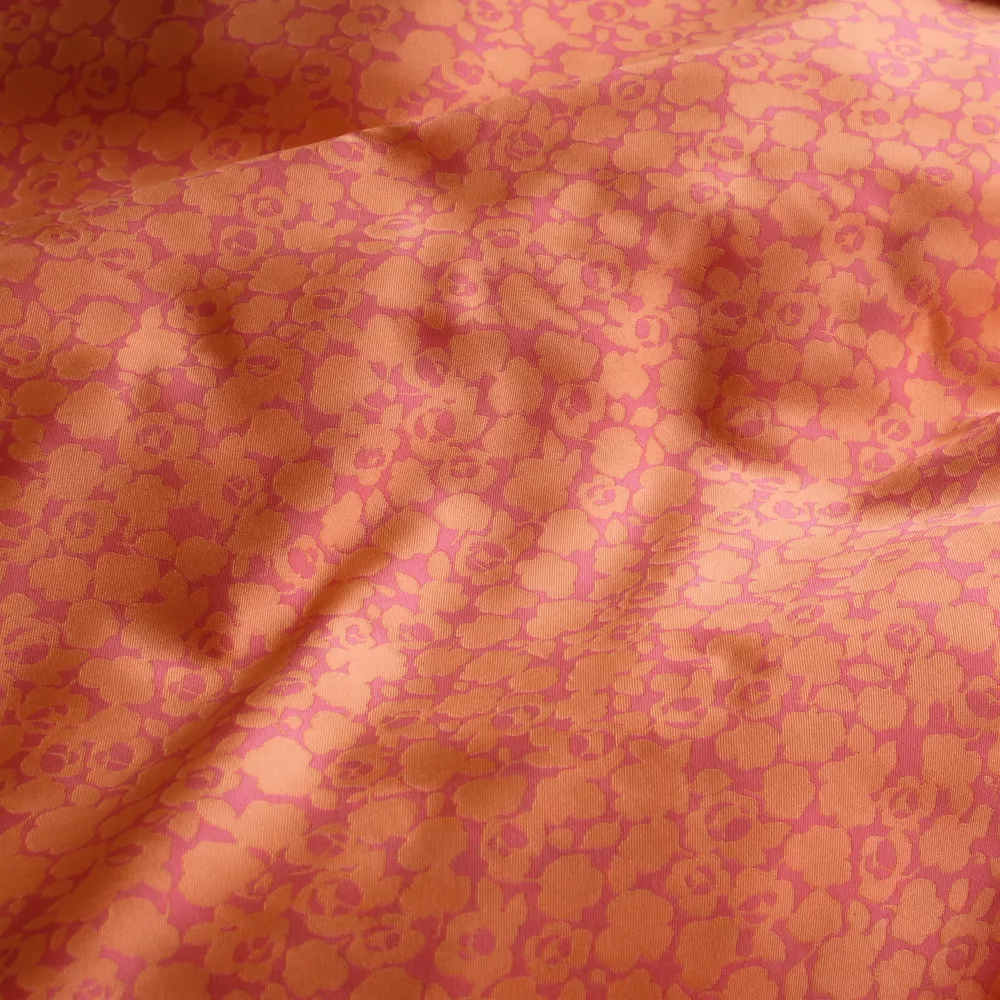 Jacquard mikado double face bloemen oranje/roos - Lorré