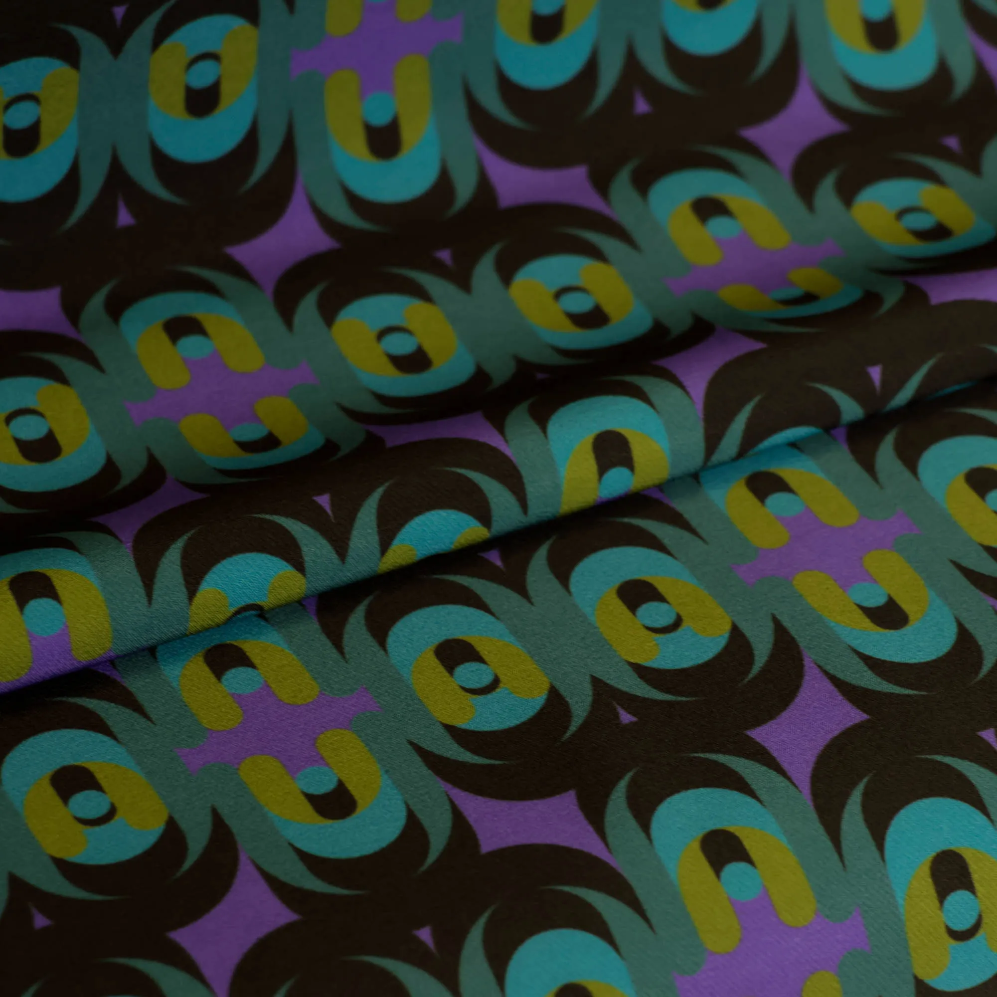 Zware polyester stretch groen-paars abstract patroon  - knipmode