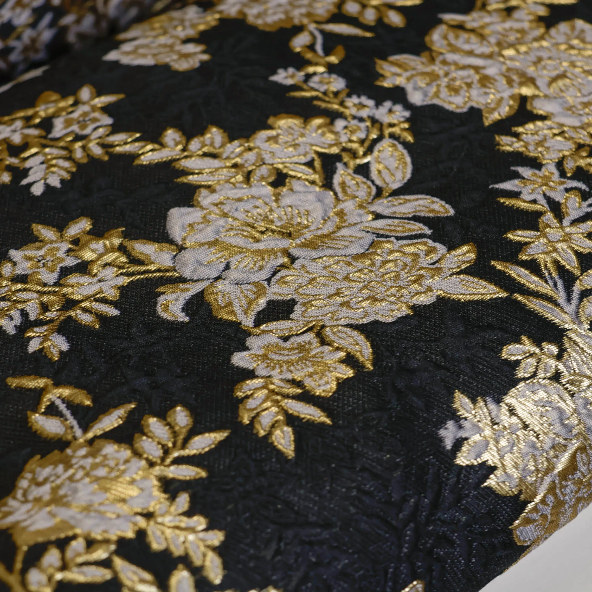 Jacquard polyester met gouden bloemen