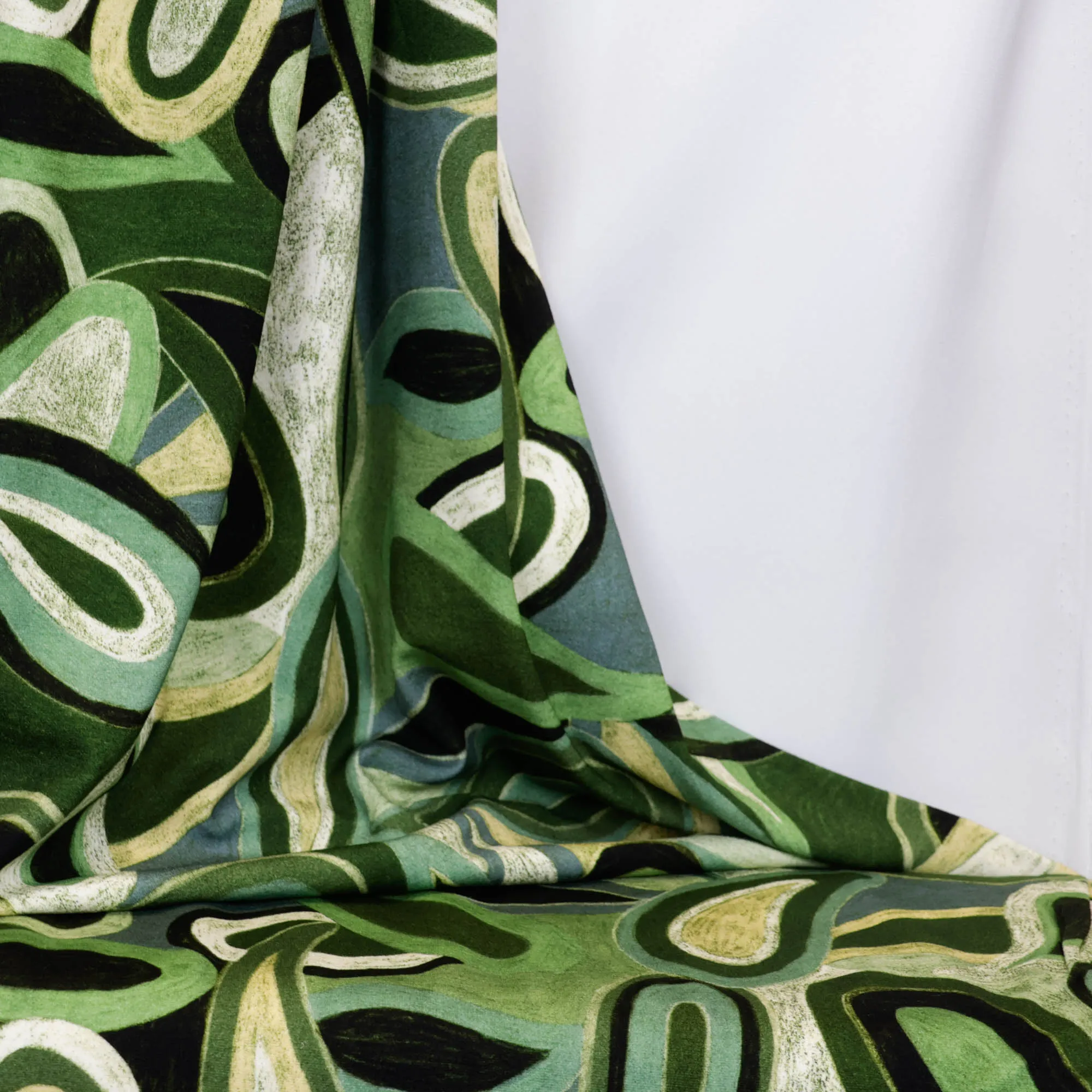 Viscose tricot met groen patroon
