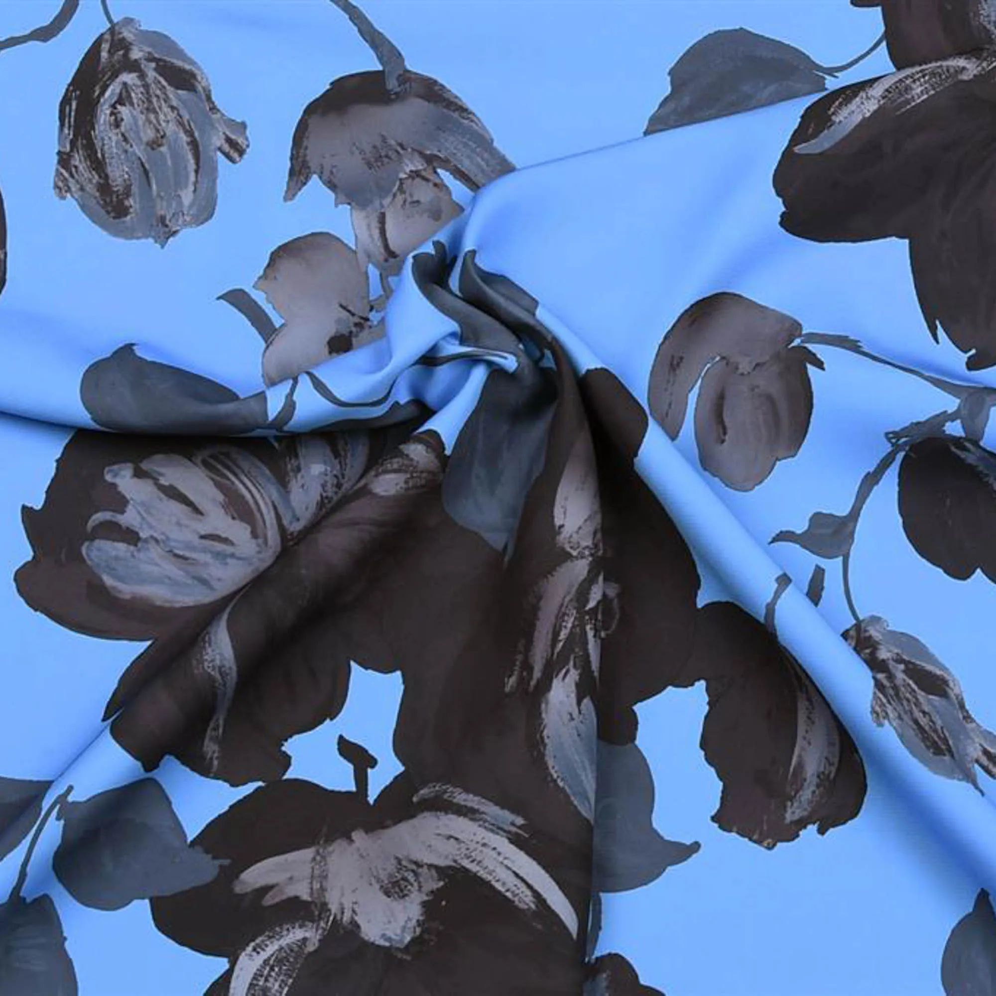Polyester blauw met sierlijke zwarte bloemen