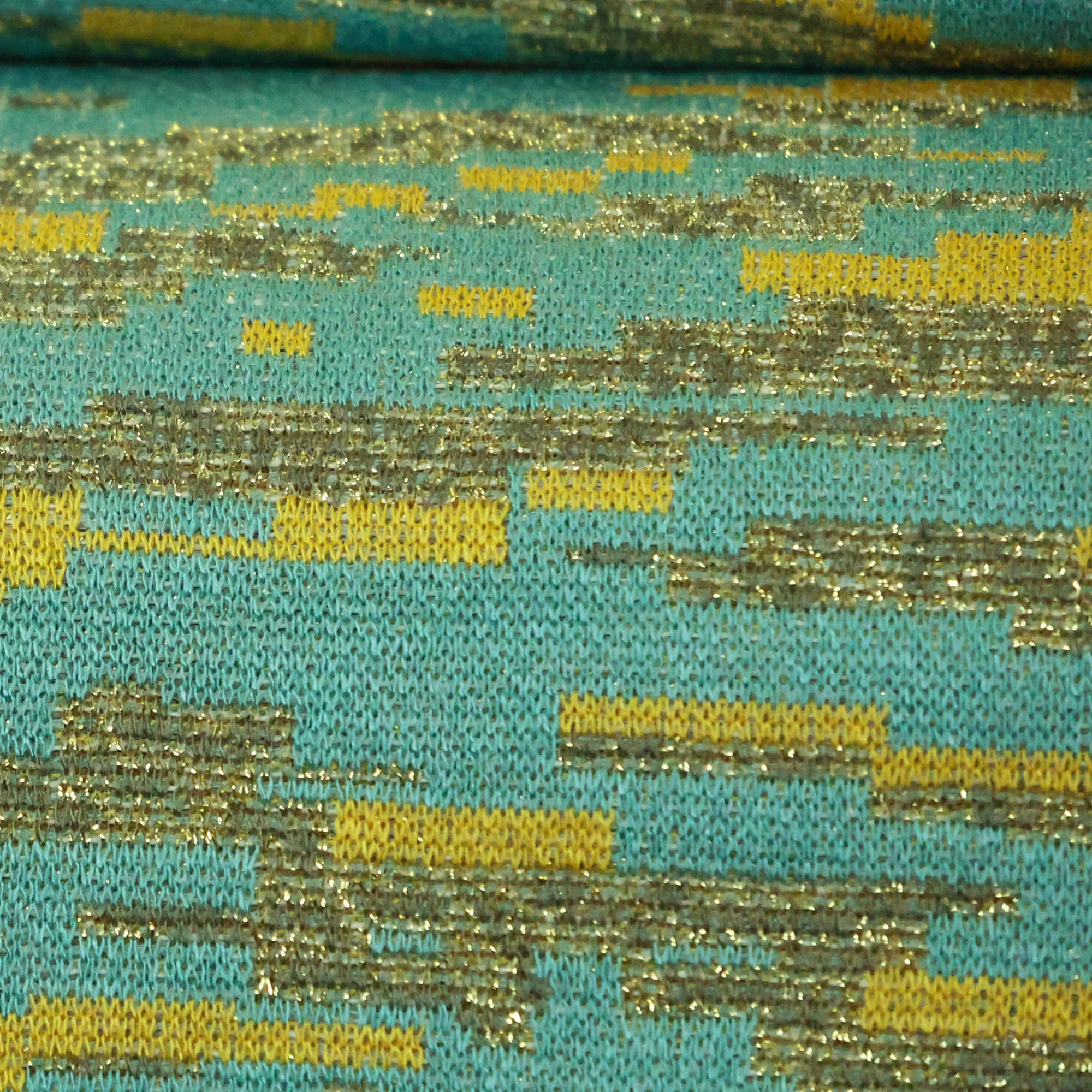 Jacquard tricot blauw met gouden en gele elementen