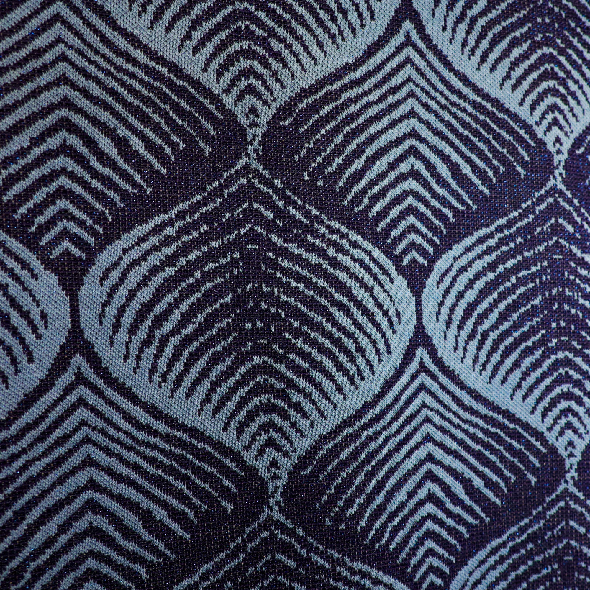 Jacquard tricot blauw met abstract patroon en lichte glinstering