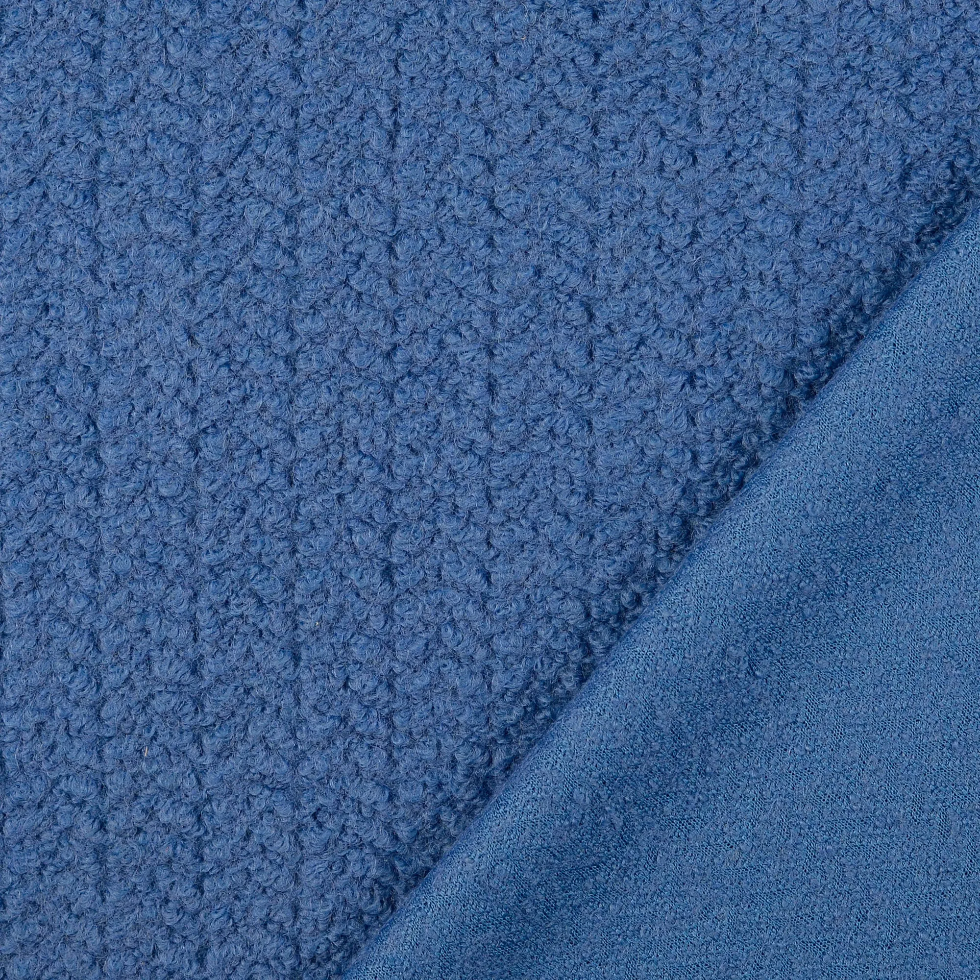 Bouclé blauw met visgraatpatroon