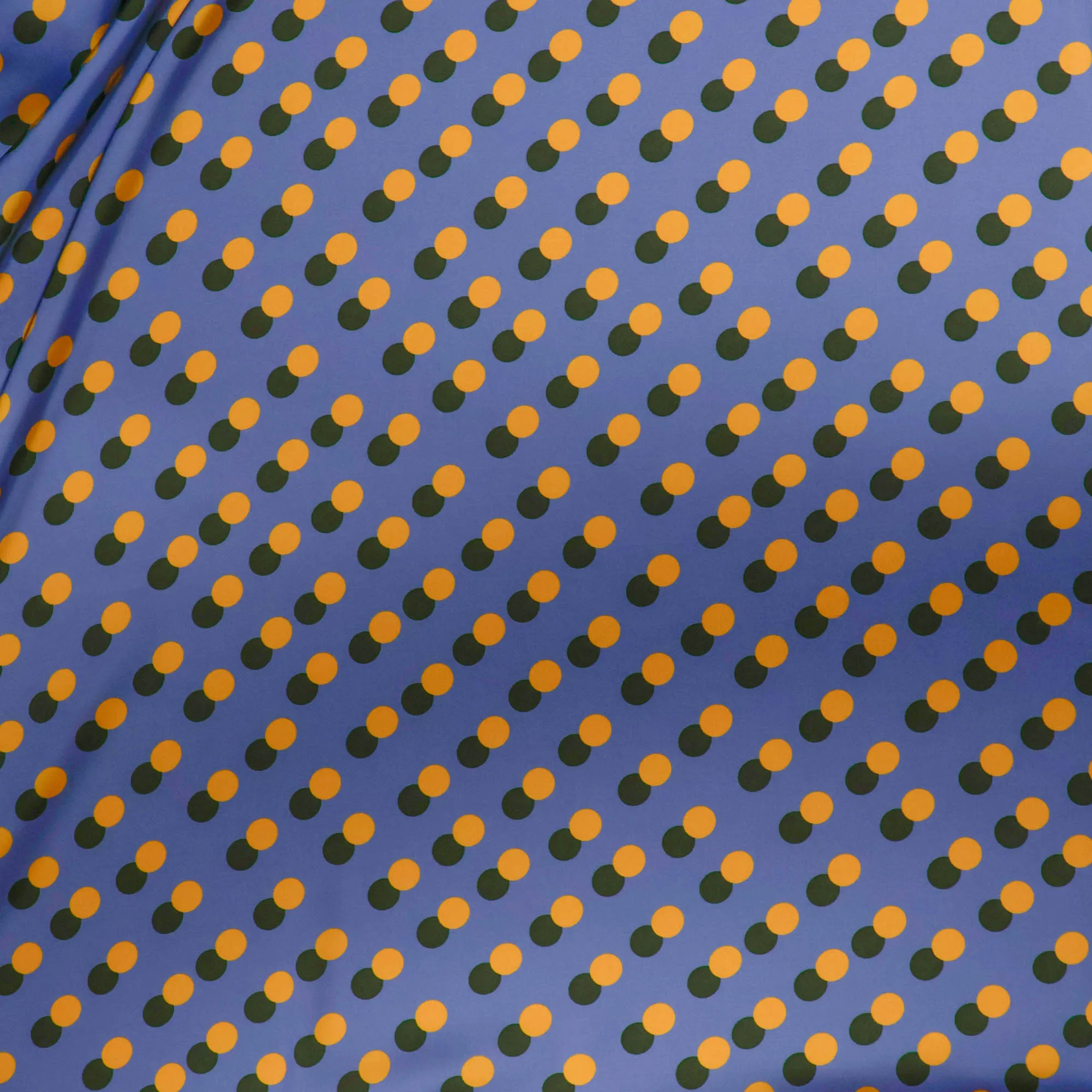 Polyester satijn blauw met oker en groene stippen - Lorré