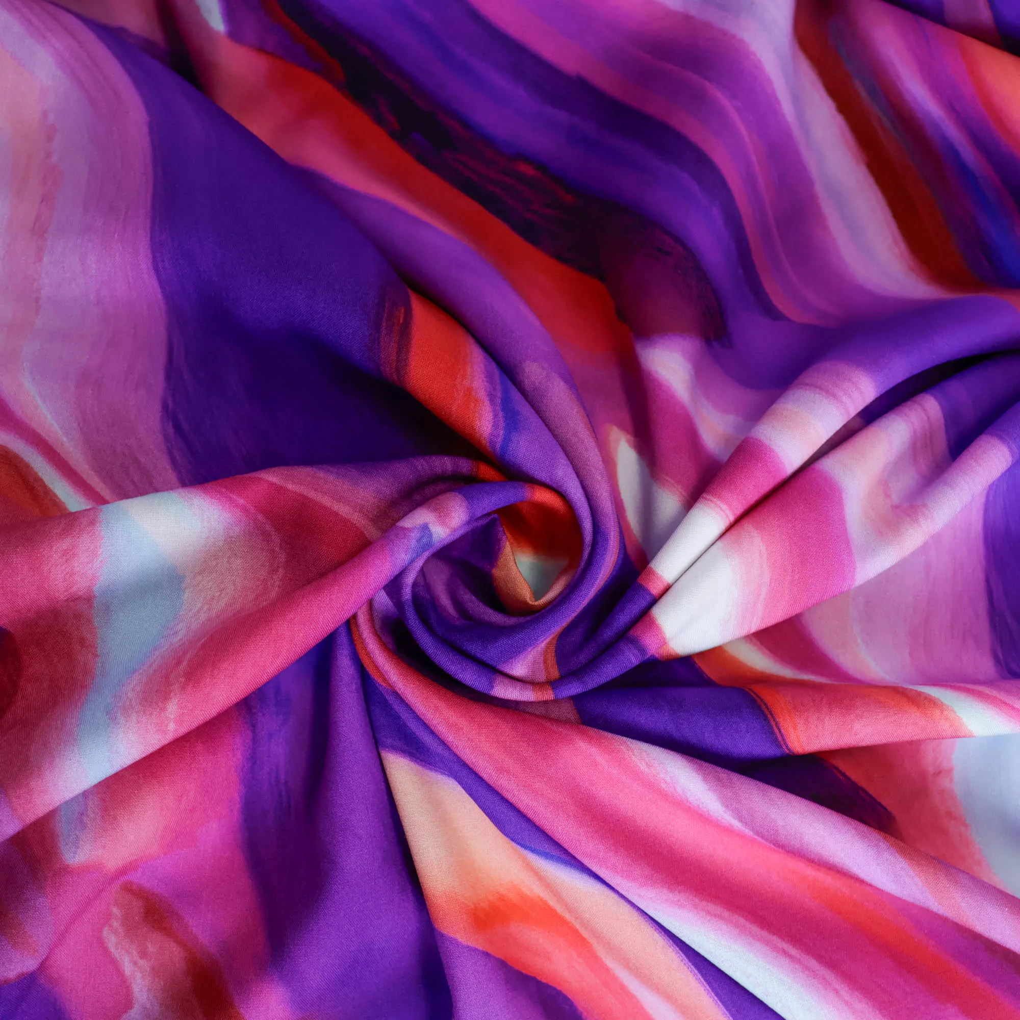 Popeline viscose met roze/paarse golven