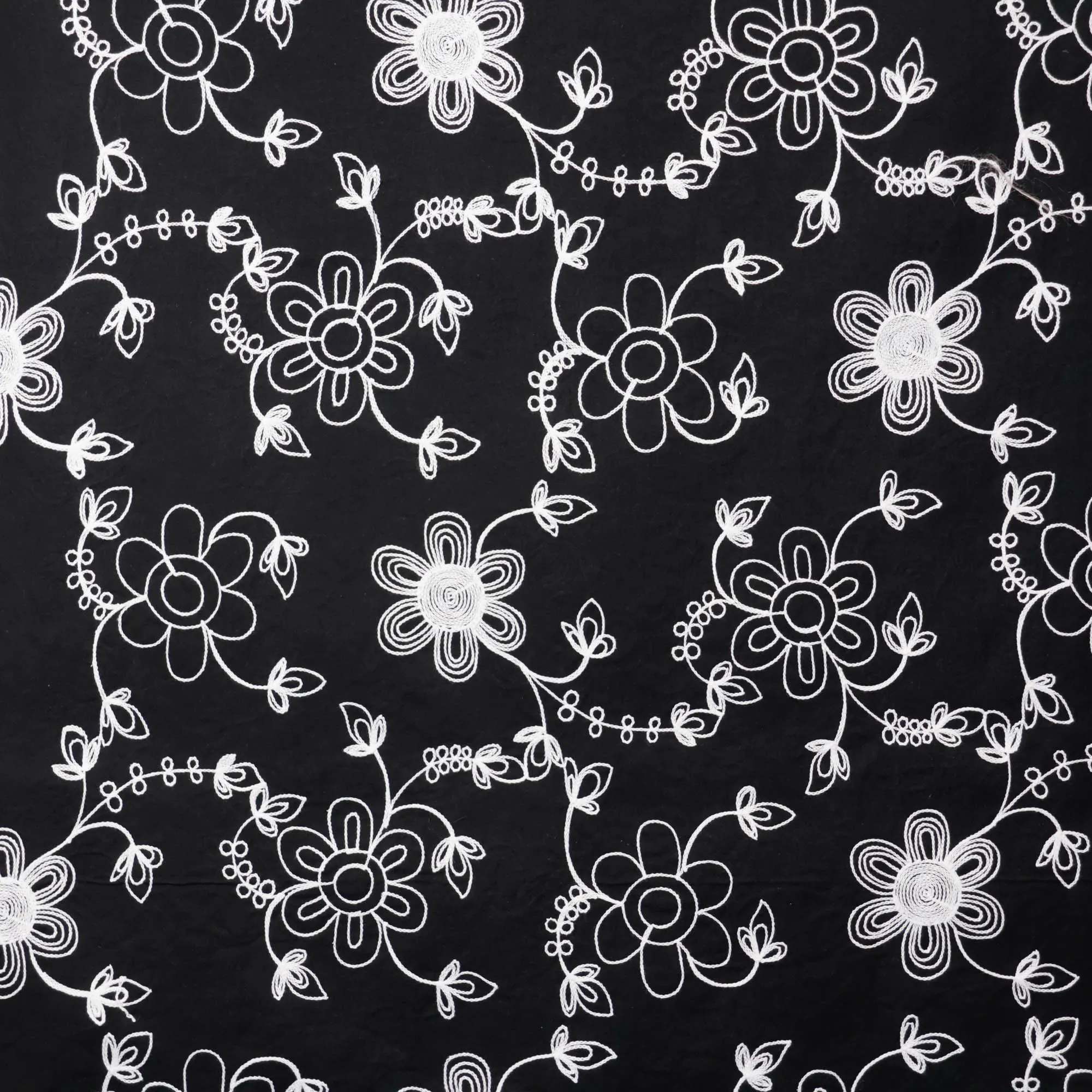 Broderie katoen zwart met bloemen