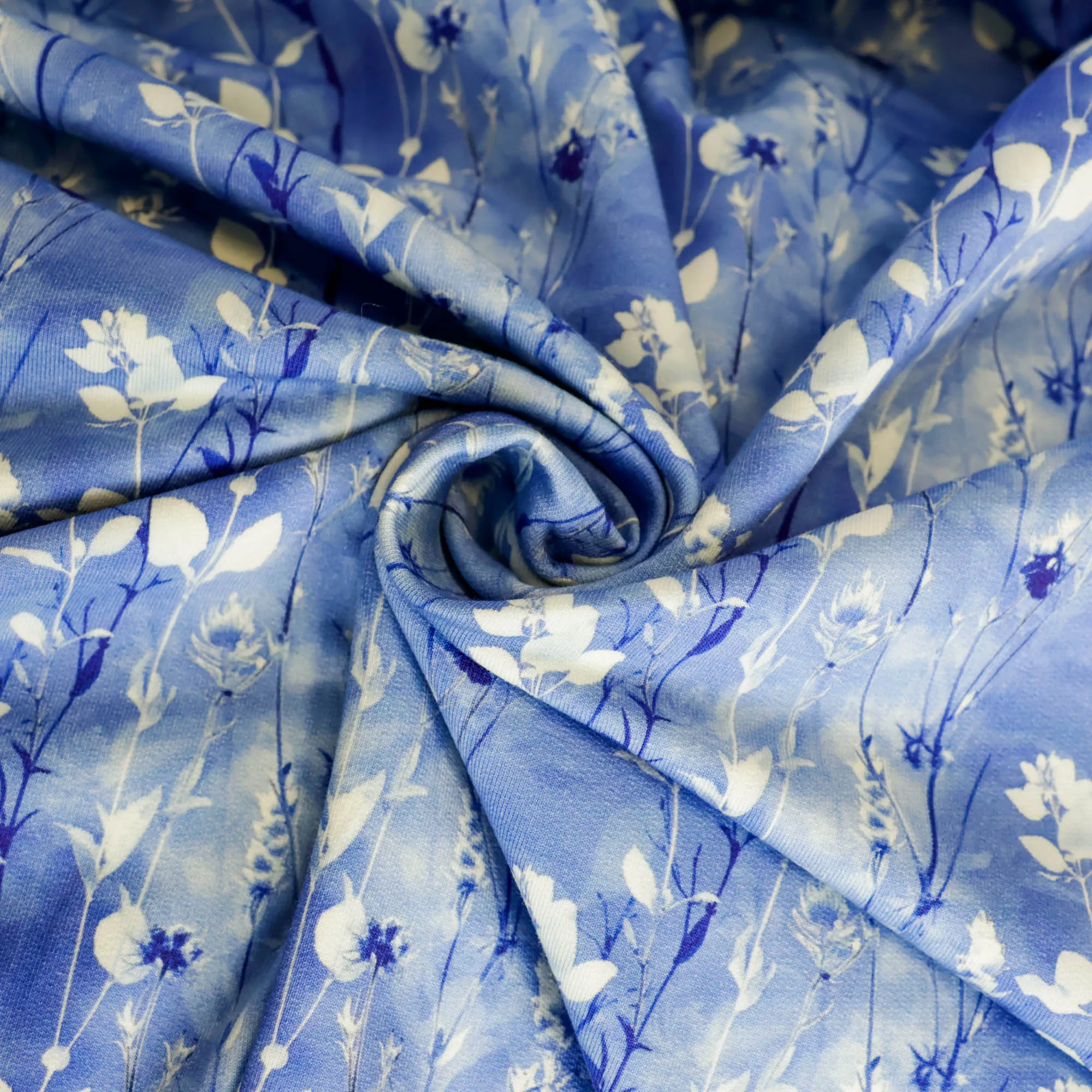 French terry blauw met bloemetjes
