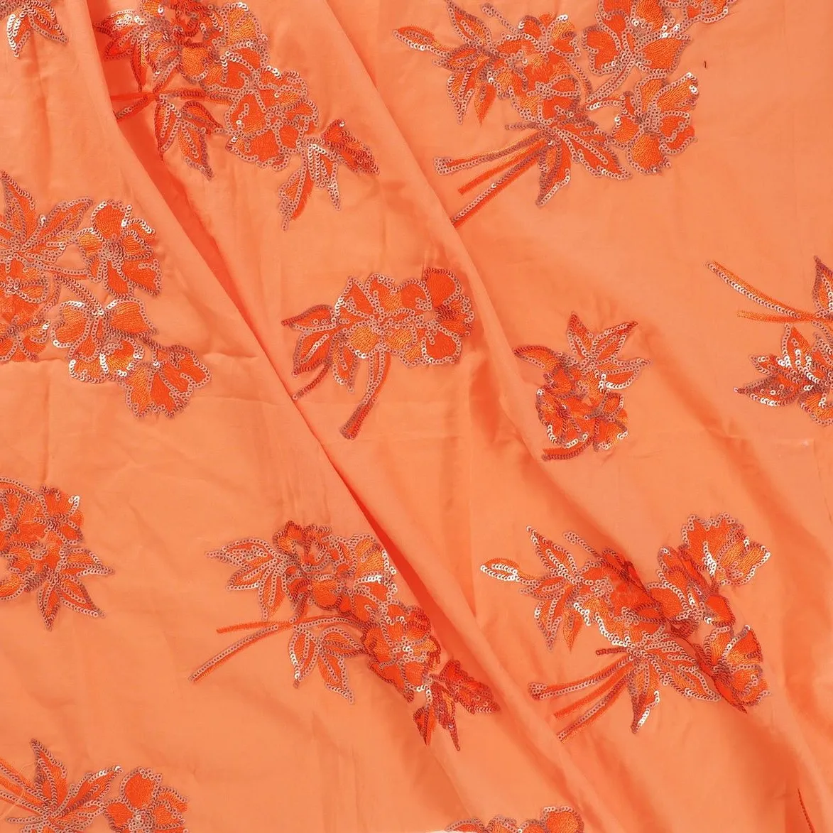 Katoen oranje geborduurd met pailletten bloemen - Lorré