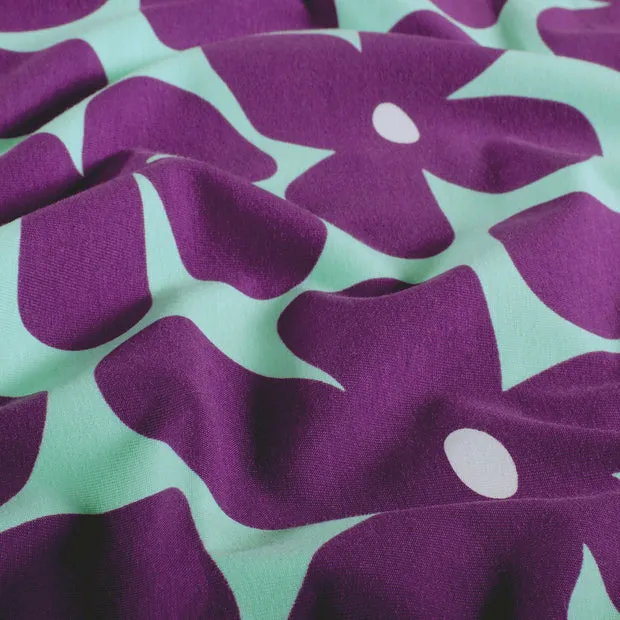 Tricot munt met paarse bloemen