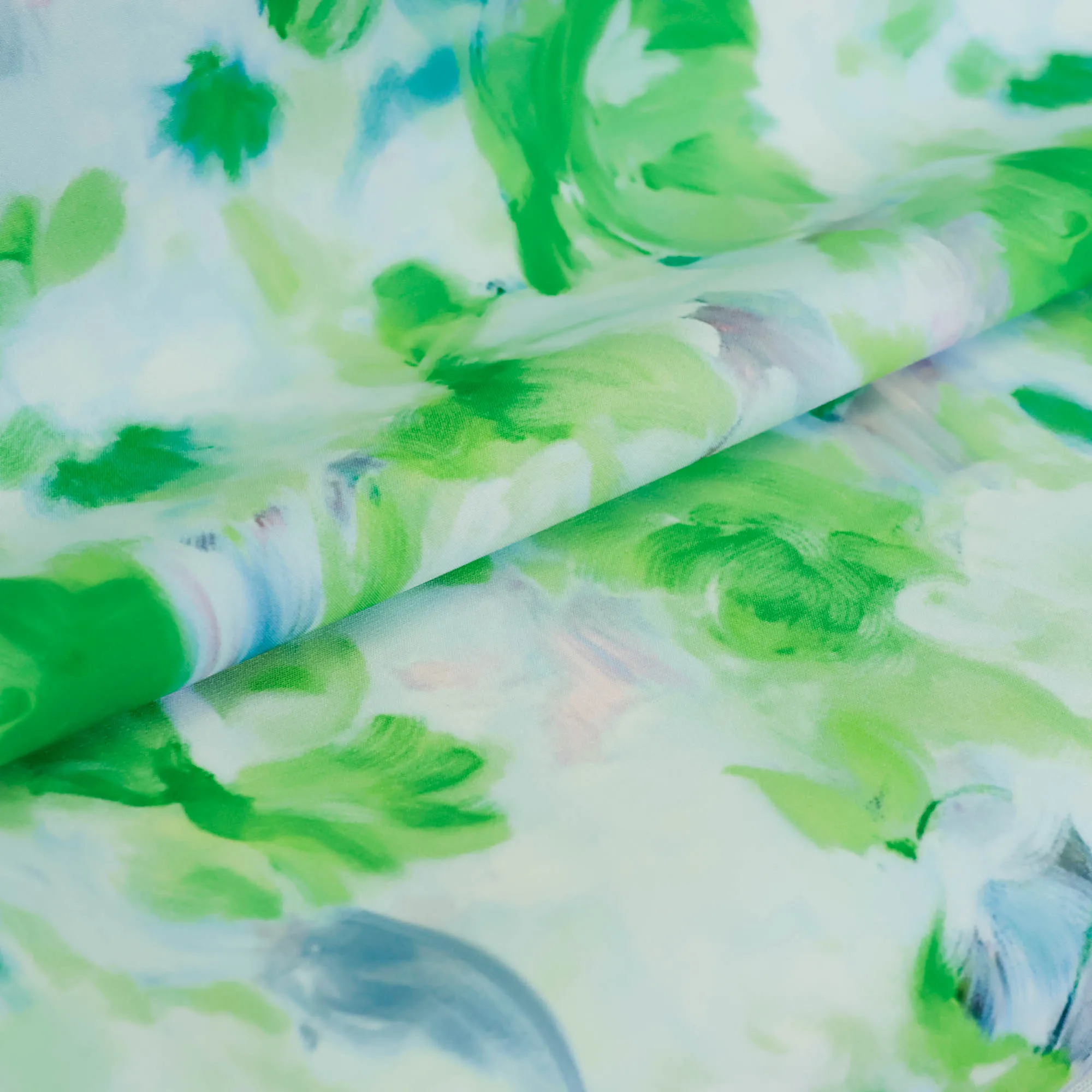 Polyester stretch met groene artistieke print