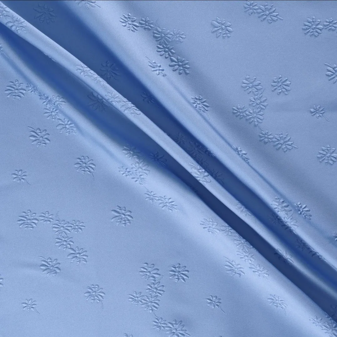 Jaquard licht blauw met fijn bloemetje - Lorré
