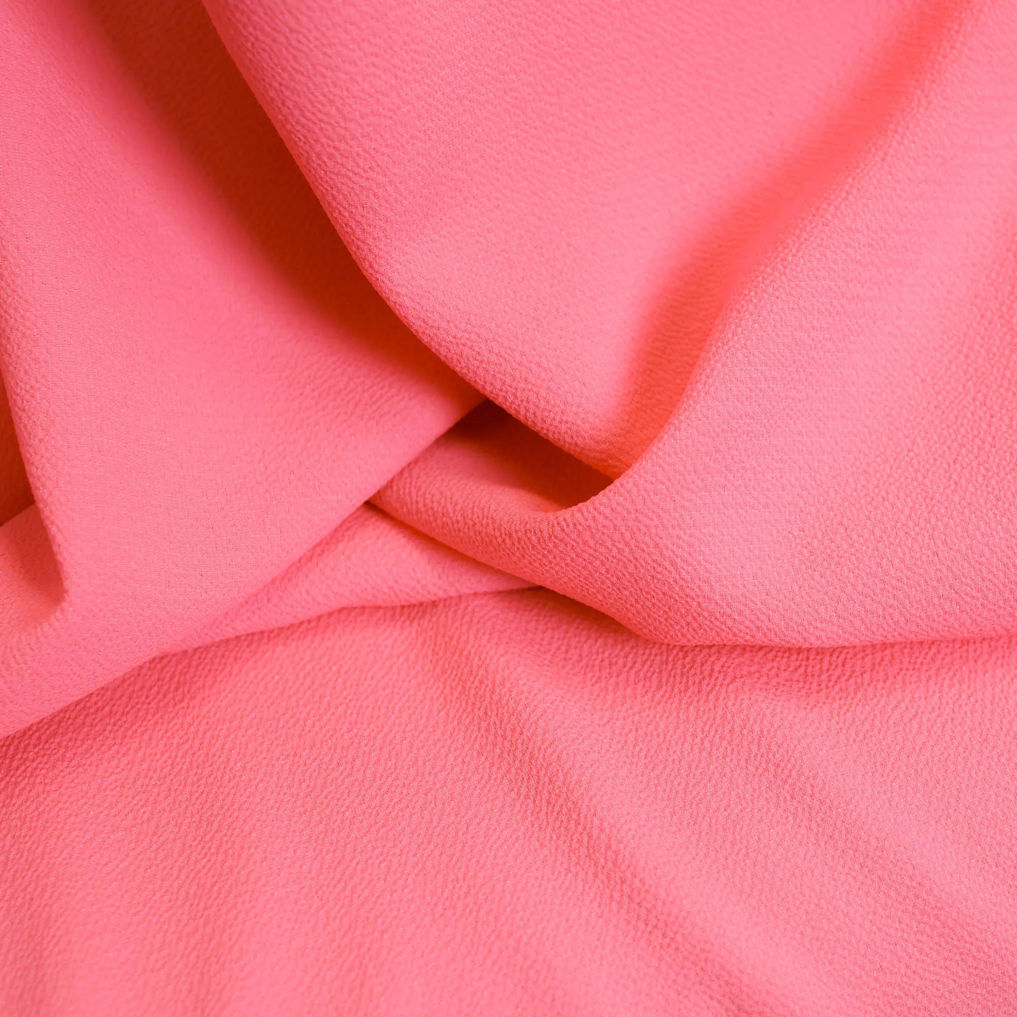 Polyester bubble crêpe fluo roze