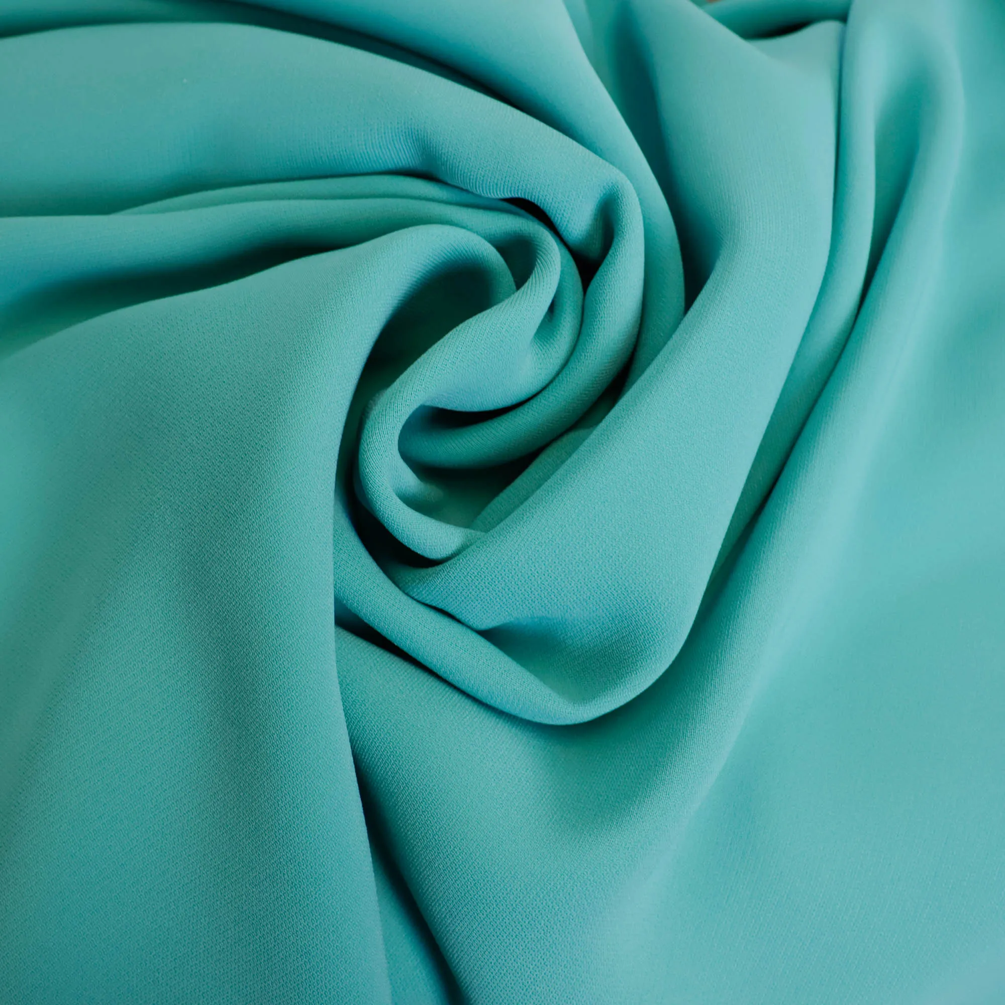 Italiaanse crêpe uni turquoise