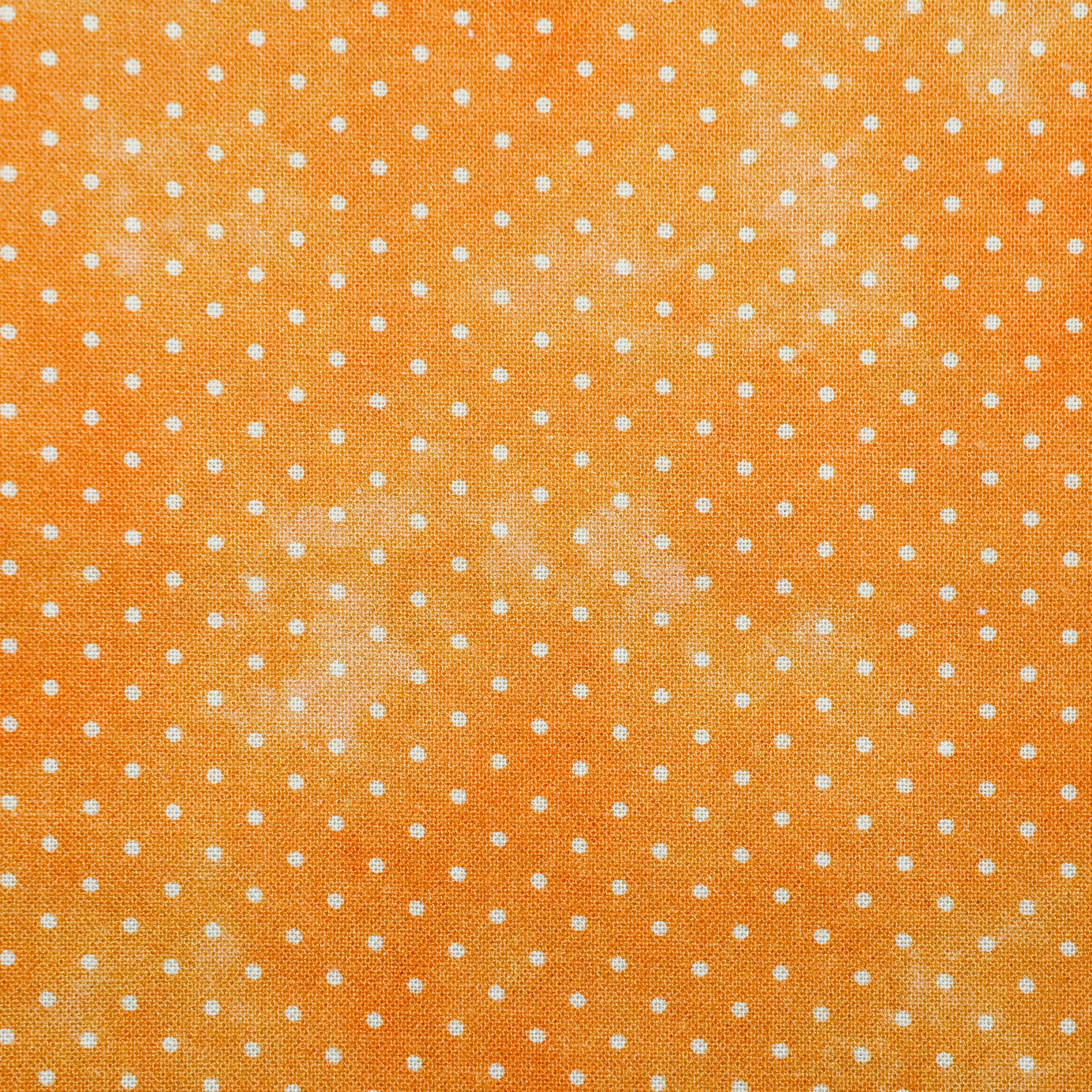 katoen-oranje-met-witte-stippen/18533