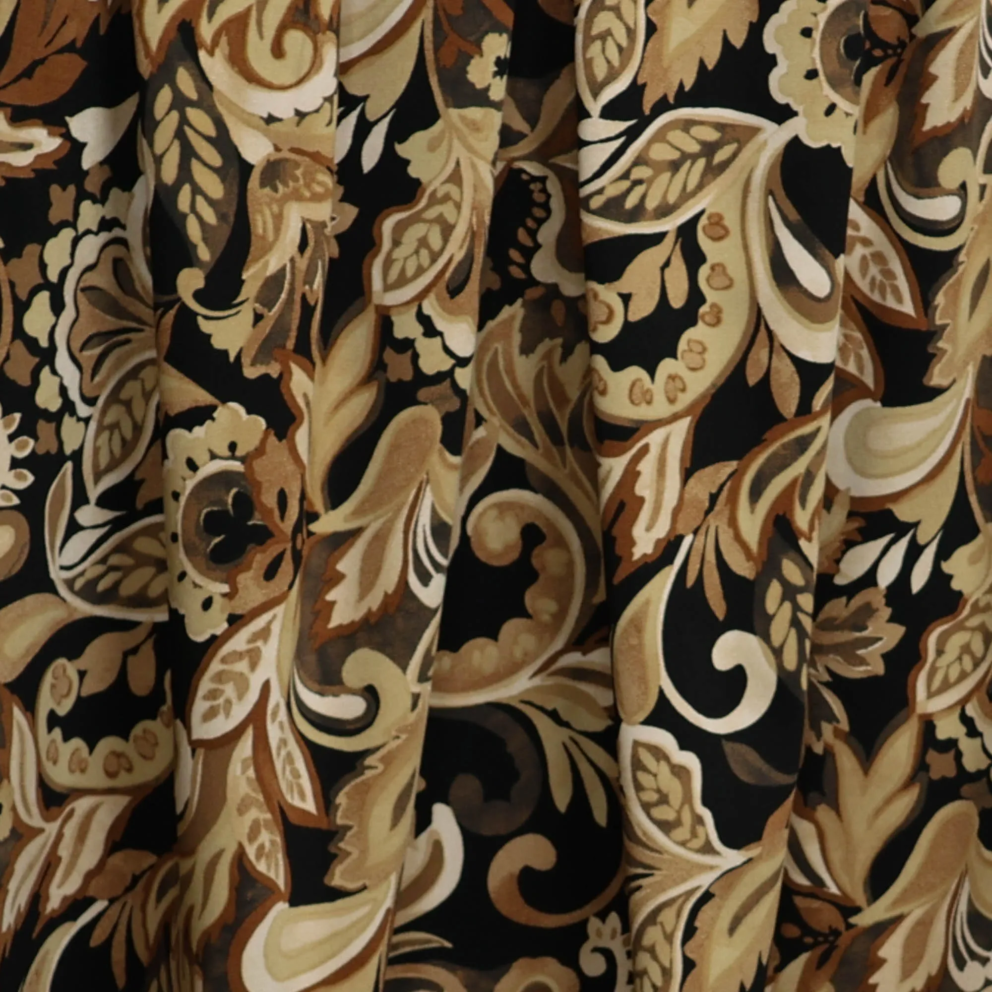 Stretch viscose camel met bladerpatroon
