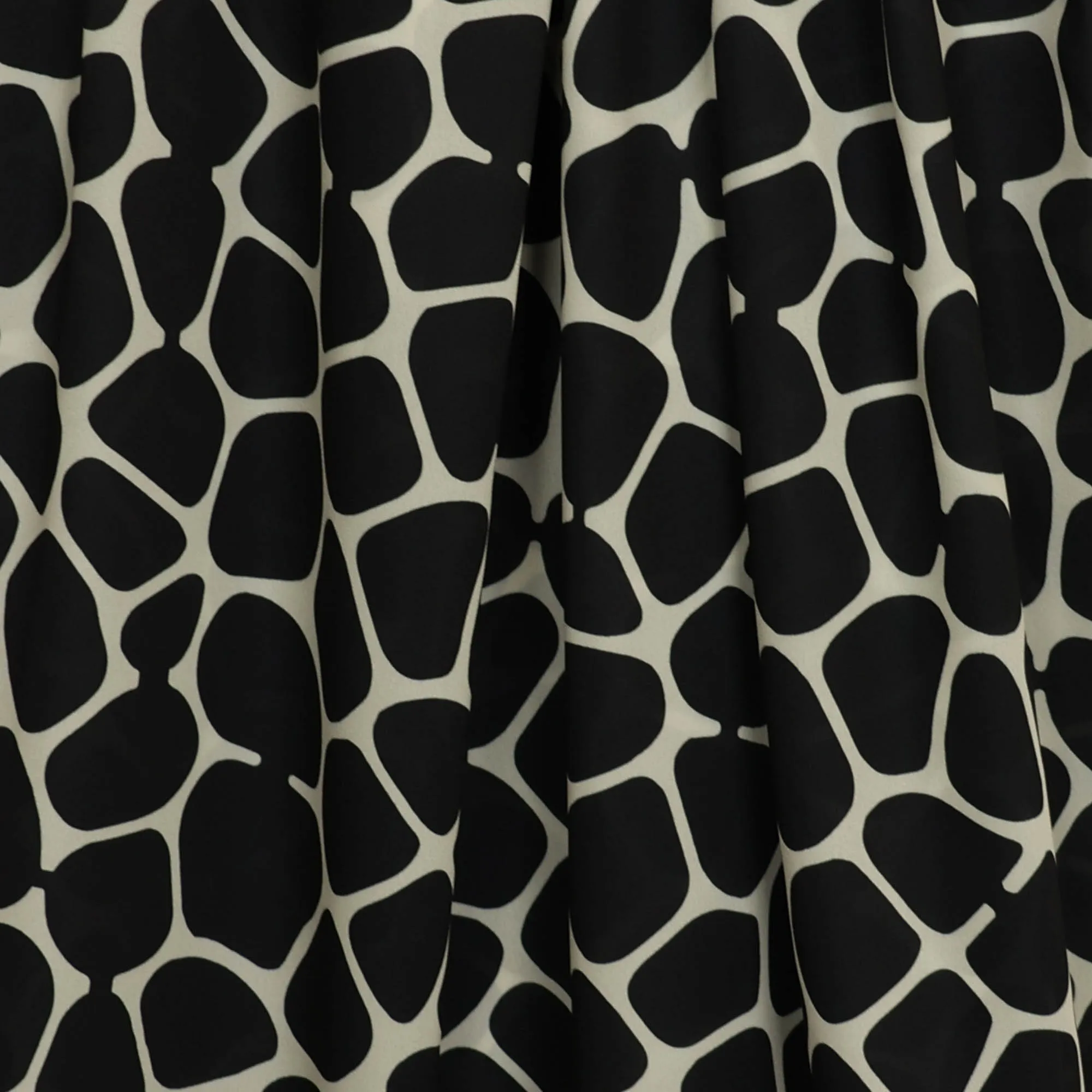 Polyester gebroken wit met zwarte bollen