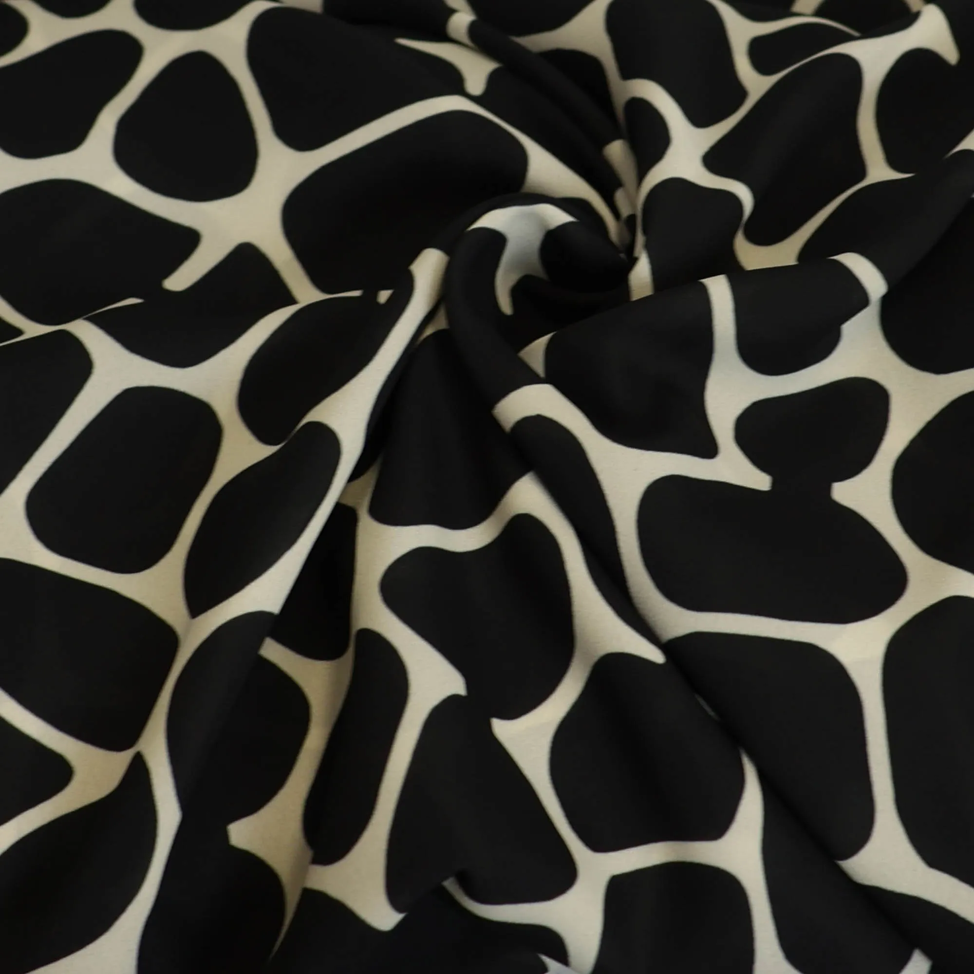 Polyester gebroken wit met zwarte bollen