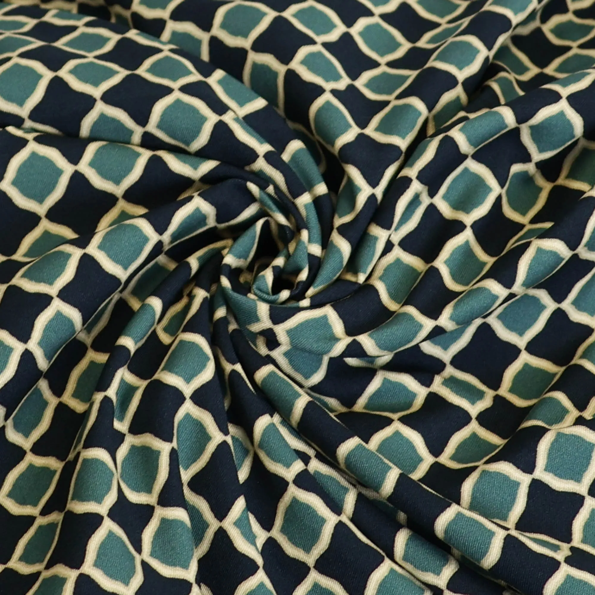 Stretch viscose donkerblauw met cirkelpatroon